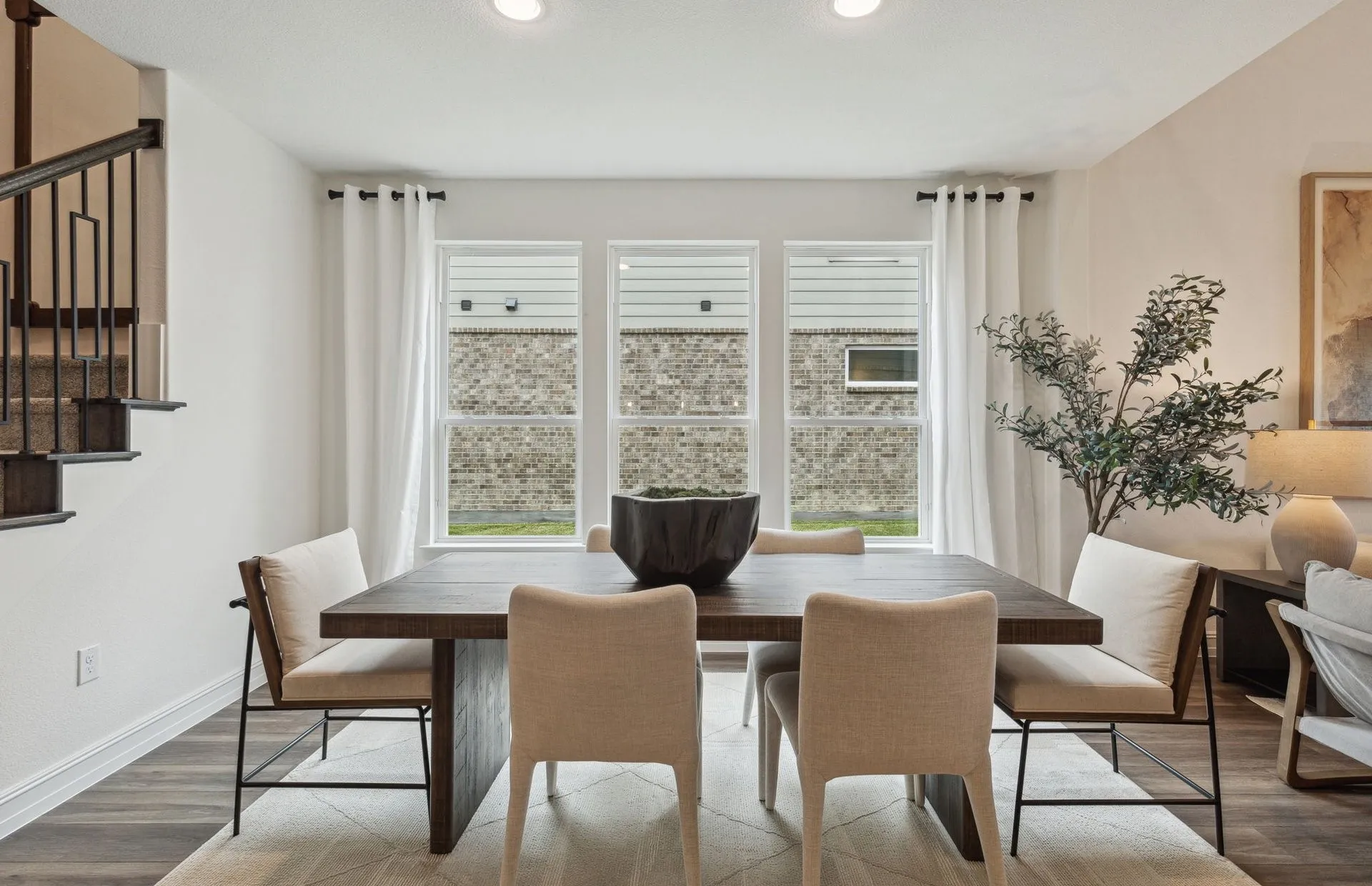 *Model Representation - Dining area off kitchen with large windows