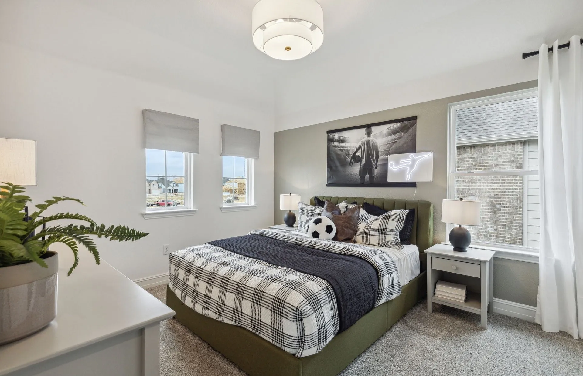 *Model Representation - Spacious secondary bedroom with large windows