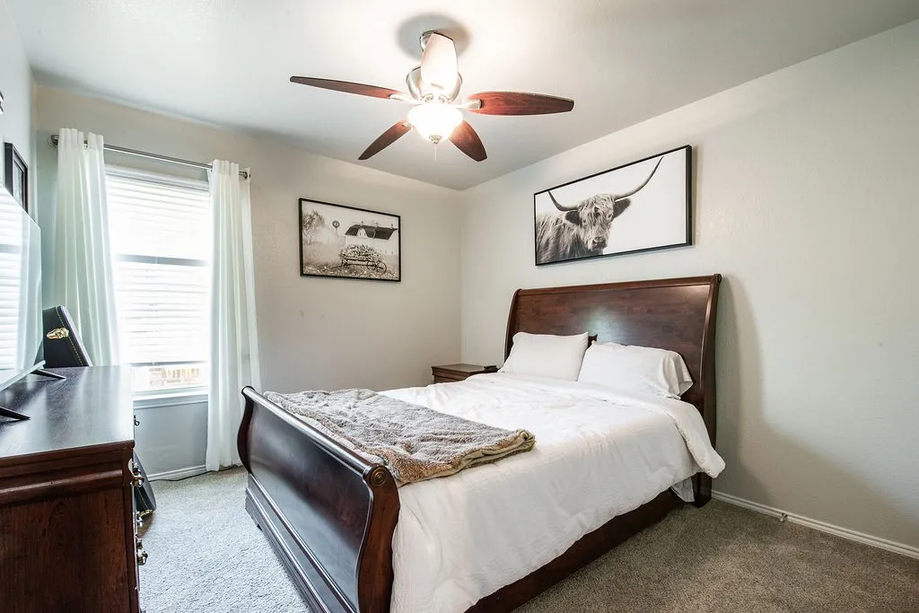 Neutral wall tones complement the plush carpeting in this private room