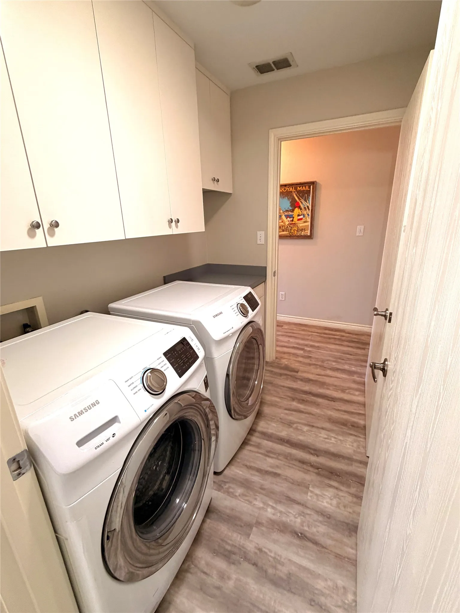 Laundry room, enter from hallway or primary bath.