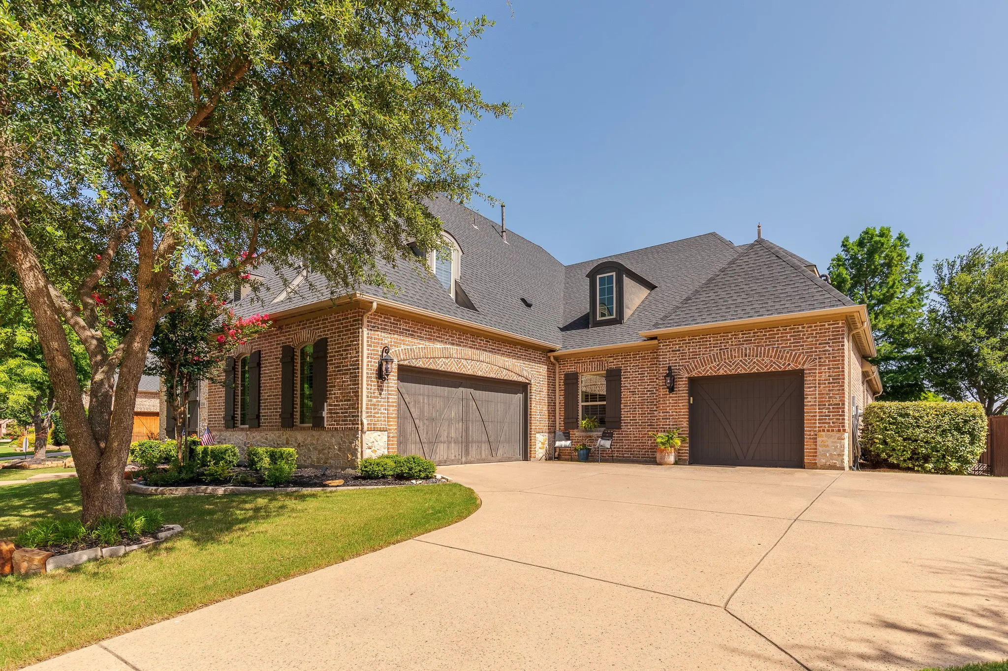3 car garage with an expanded driveway for additional car parking