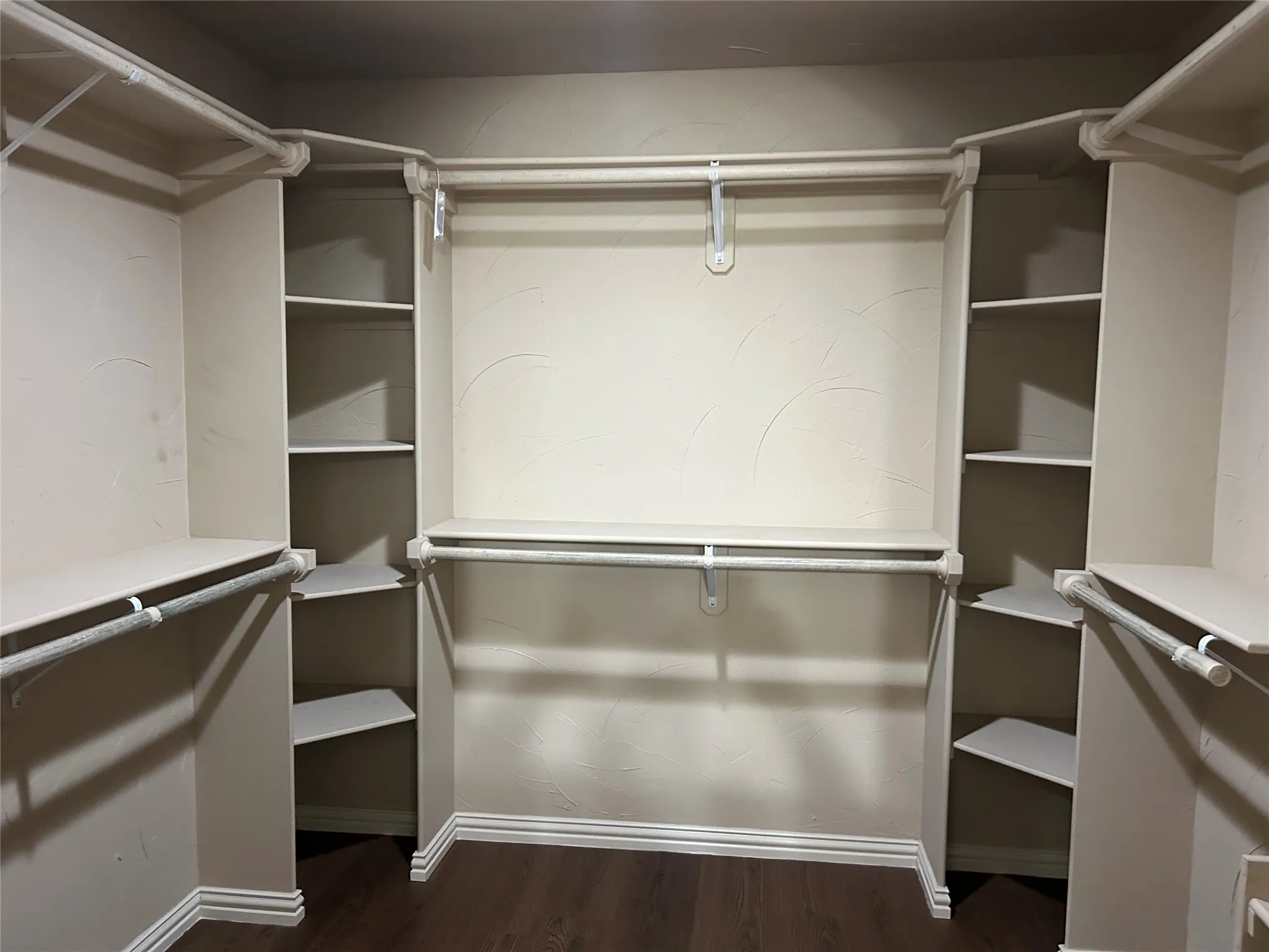 walk in closet in primary bedroom