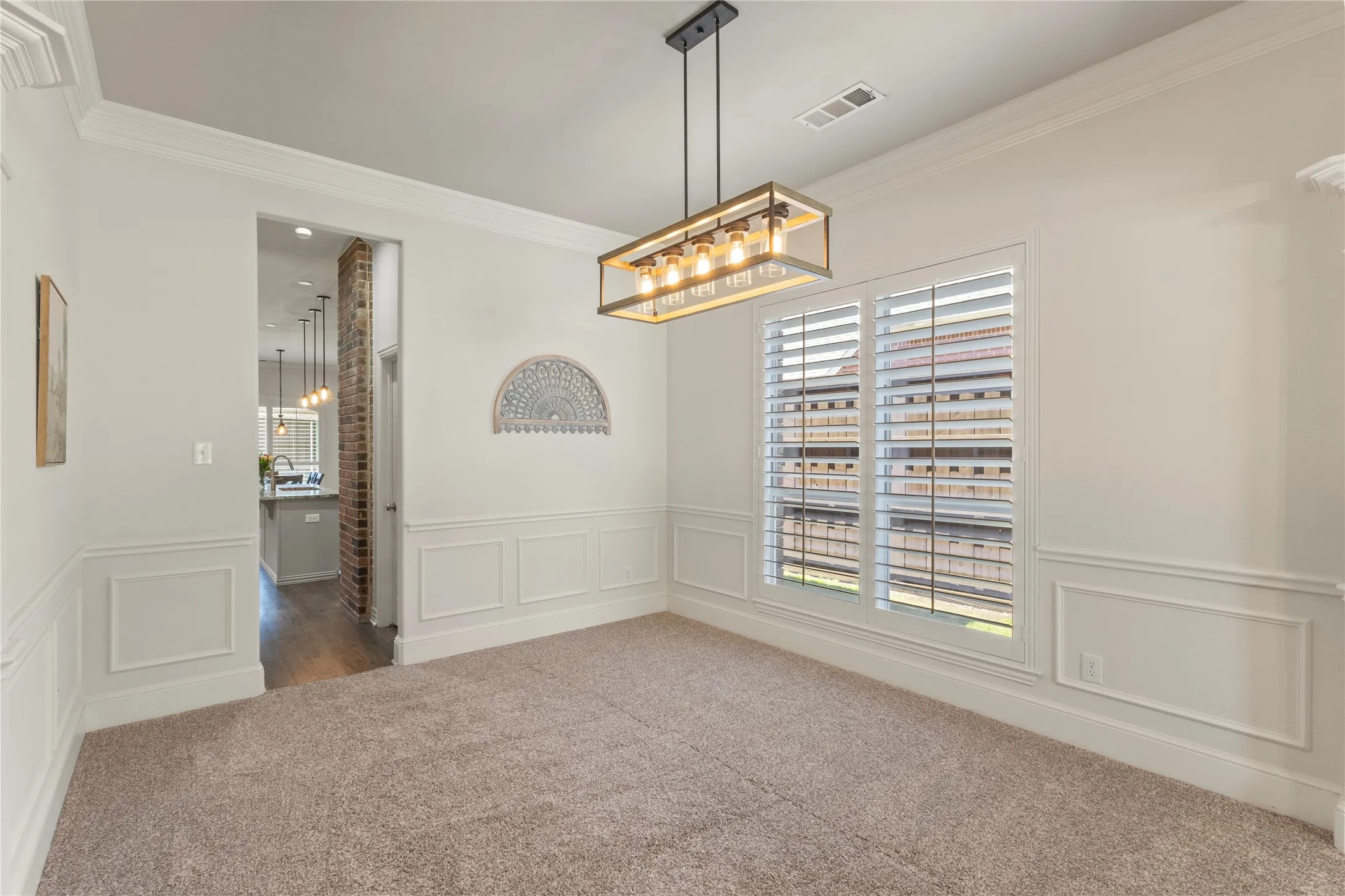Spacious dining areas off butler’s pantry