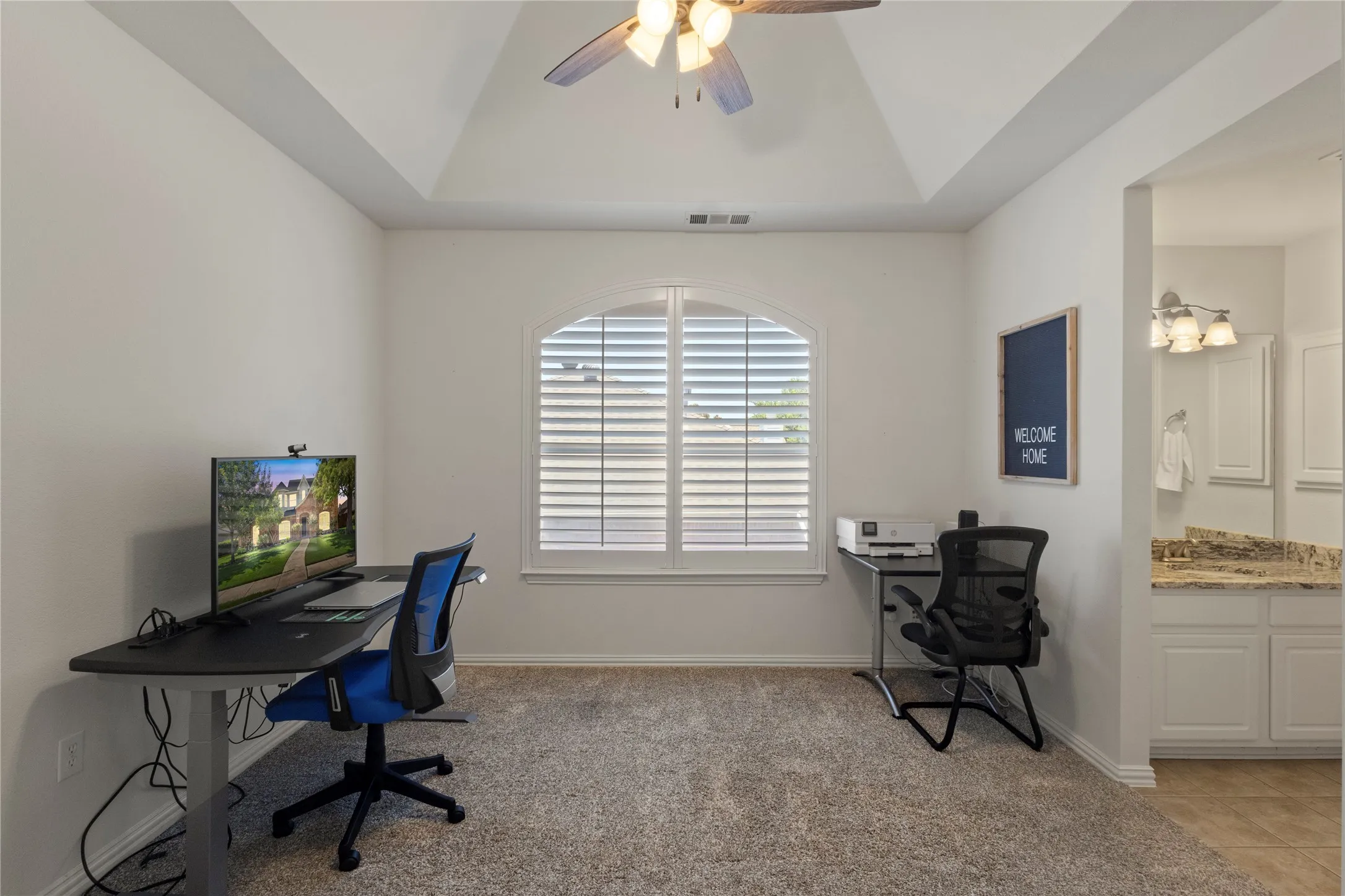 Upstairs bedroom used as an office, with Jack & Jill bath
