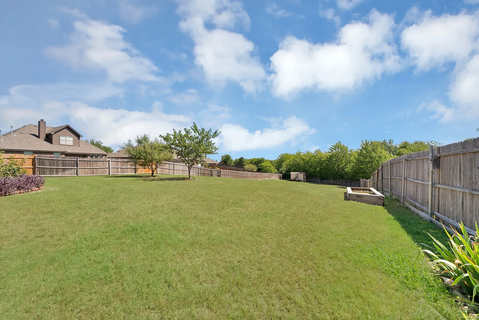 There's room to make this into your backyard paradise!!
