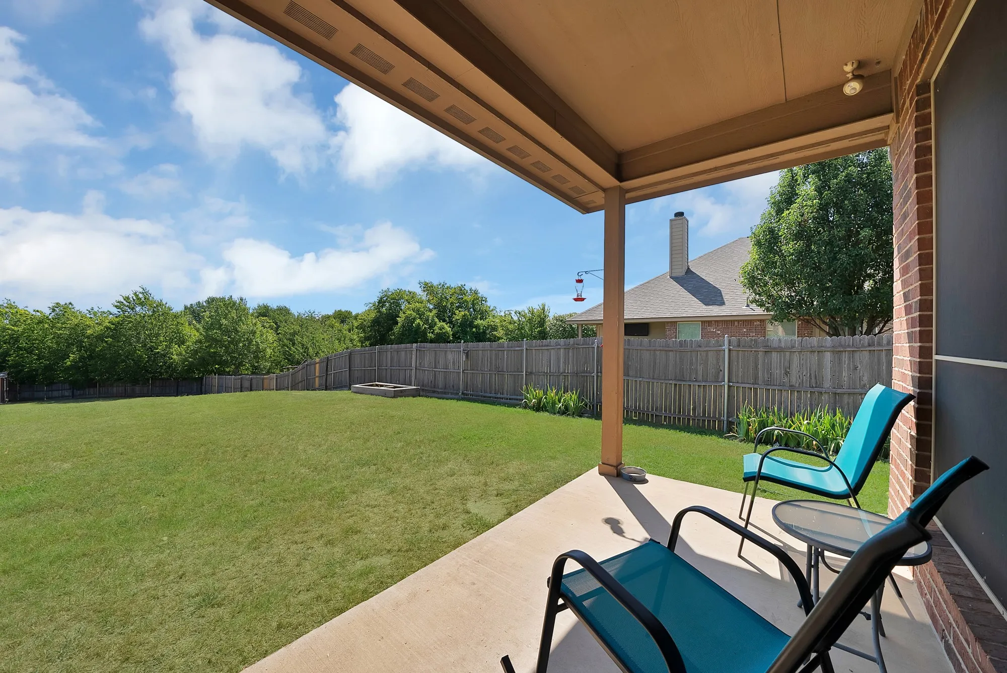 Enjoy the sunsets in the large backyard from your covered​​‌​​​​‌​​‌‌​‌‌​​​‌‌​‌​‌​‌​​​‌​​ patio