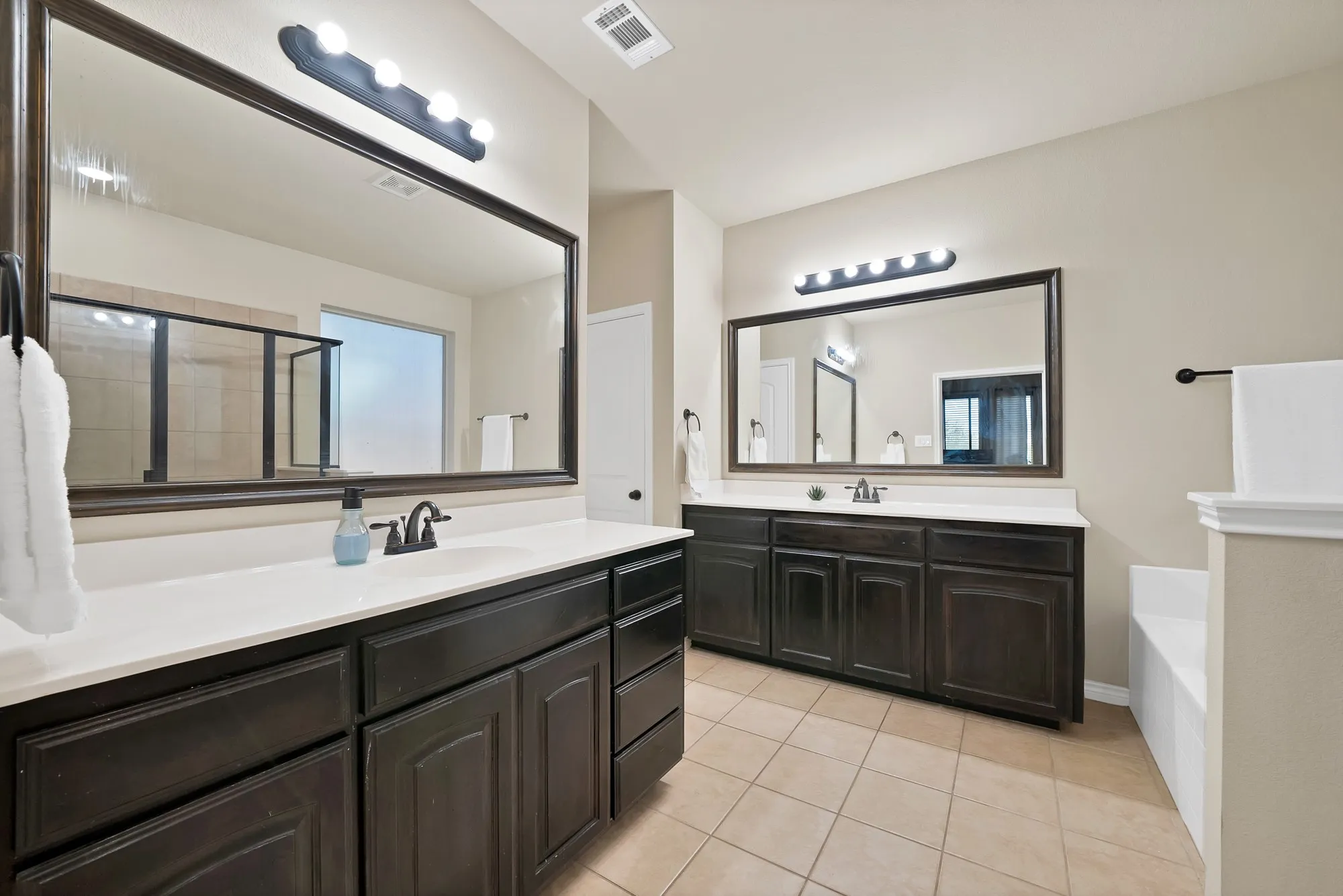 Dual Sinks, updated bathroom has large WIC