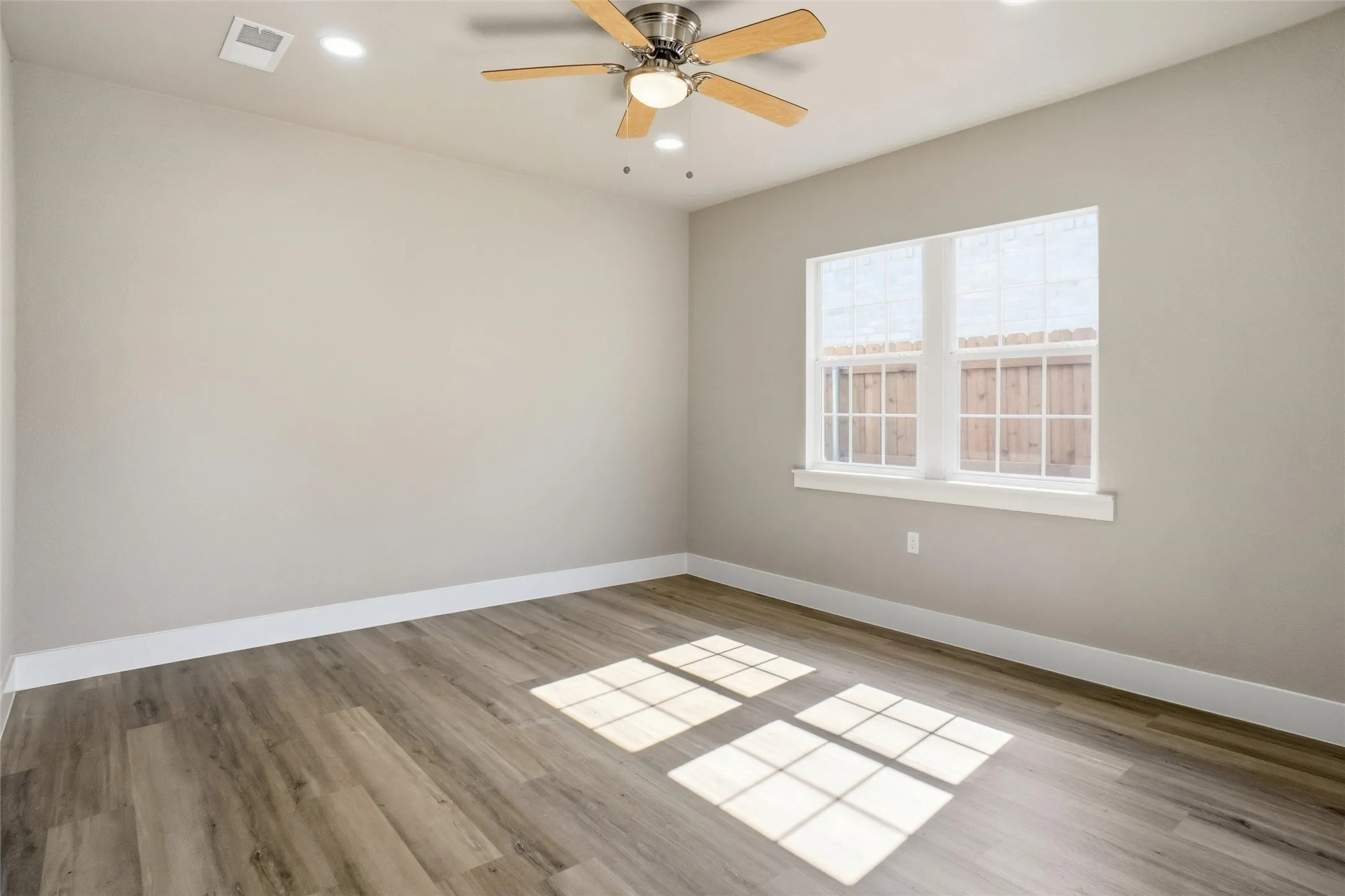 Second Photo of Living Room and Ceiling Fan