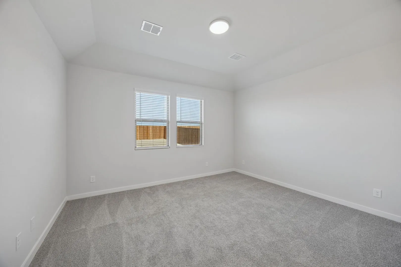 Primary Suite in the Oak II home plan by Trophy Signature Homes – REPRESENTATIVE PHOTO