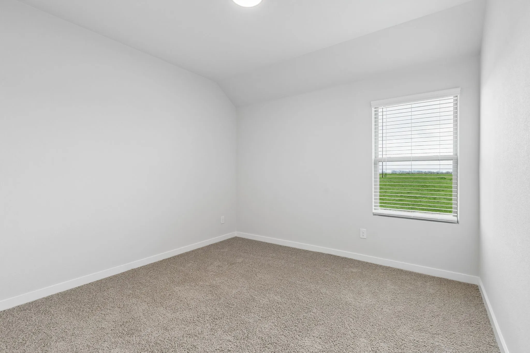 Bedroom in the Oscar home plan by Trophy Signature Homes – REPRESENTATIVE PHOTO