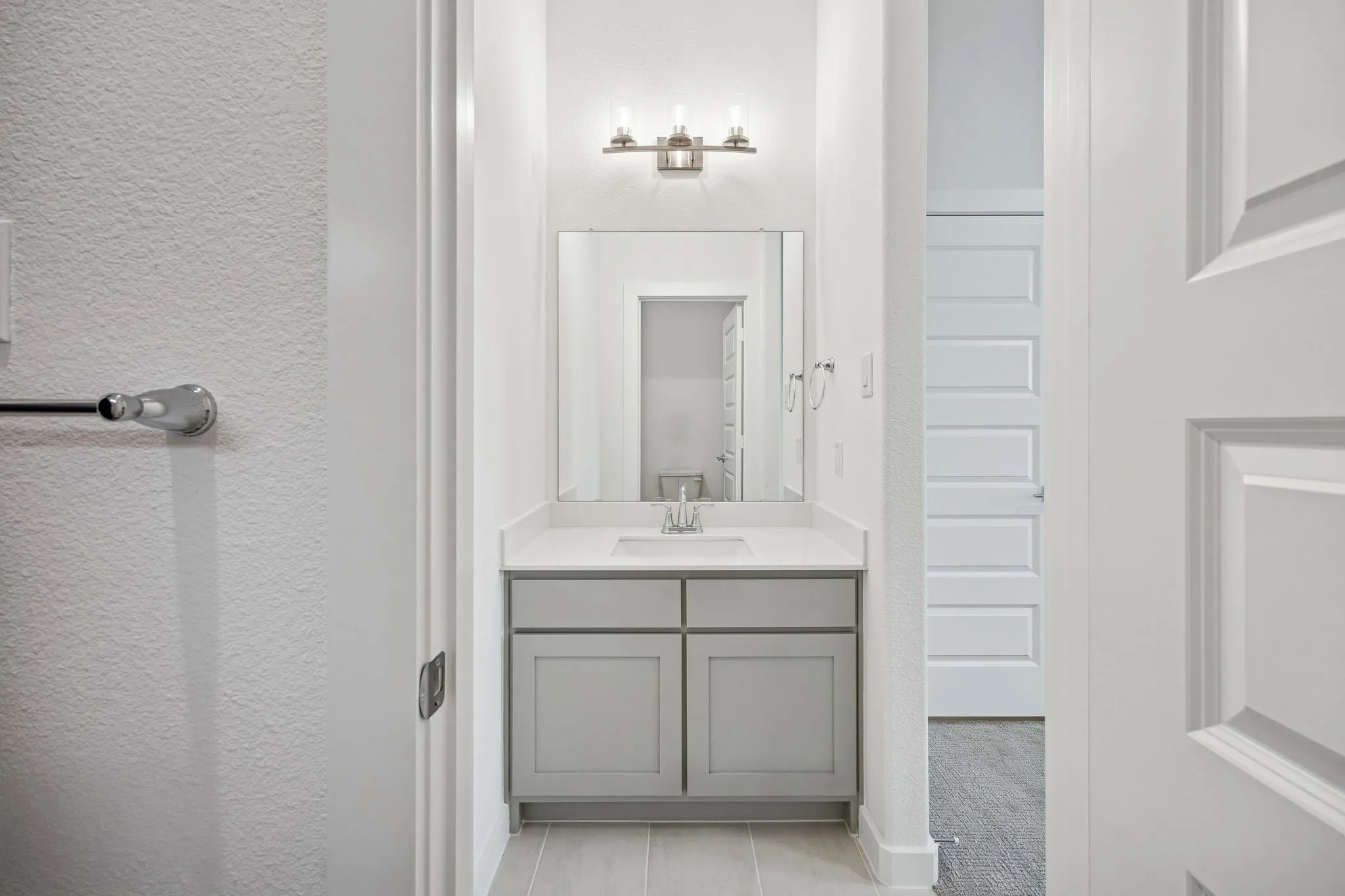 Bathroom in the Gilmour II home plan by Trophy Signature Homes – REPRESENTATIVE PHOTO