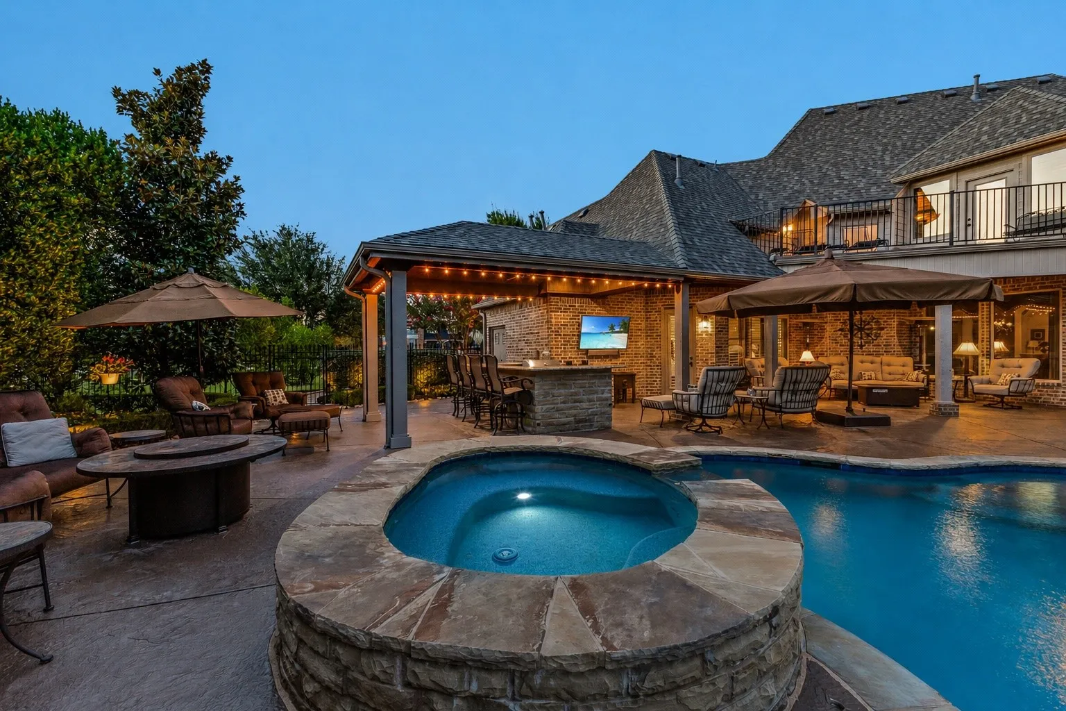 Extensive outdoor entertaining spaces and an oversized spa.