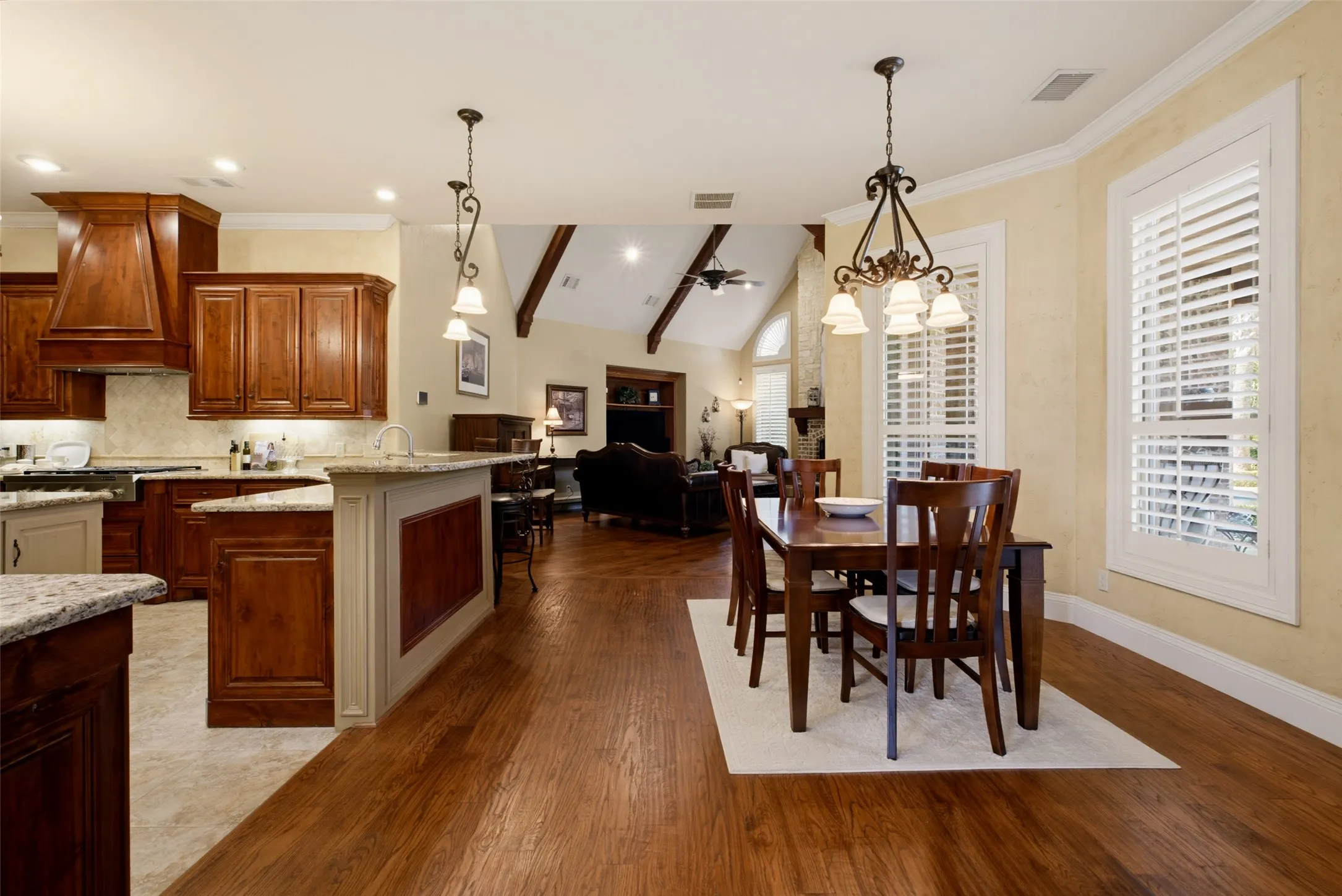 Wood-finish flooring throughout the dining area