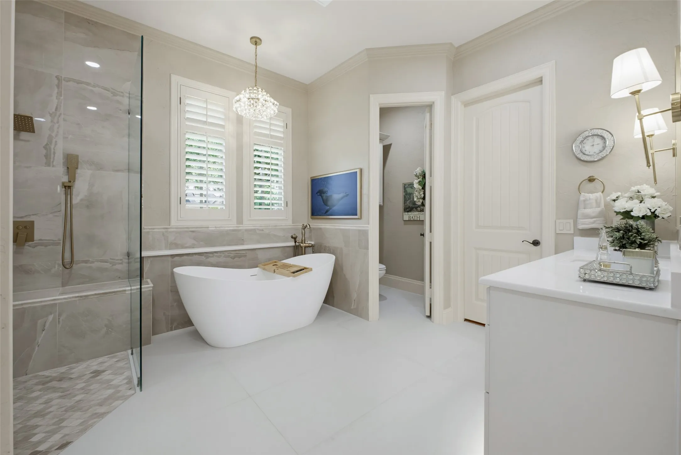 Recently updated bathrooms with new tile, fixtures, paint, and lighting.