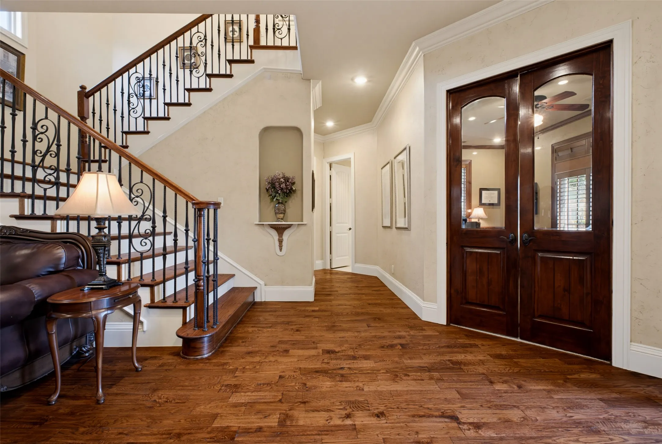 Rich wood-finish flooring throughout