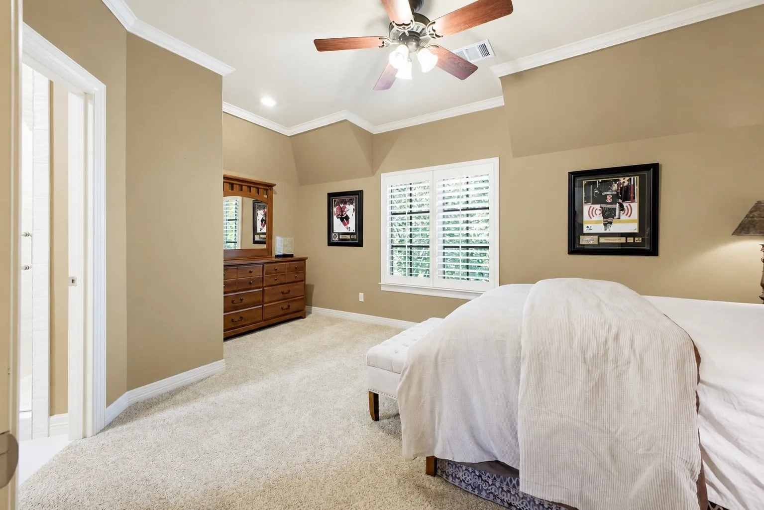 Large bedroom upstairs with ensuite bath and walk in closet.