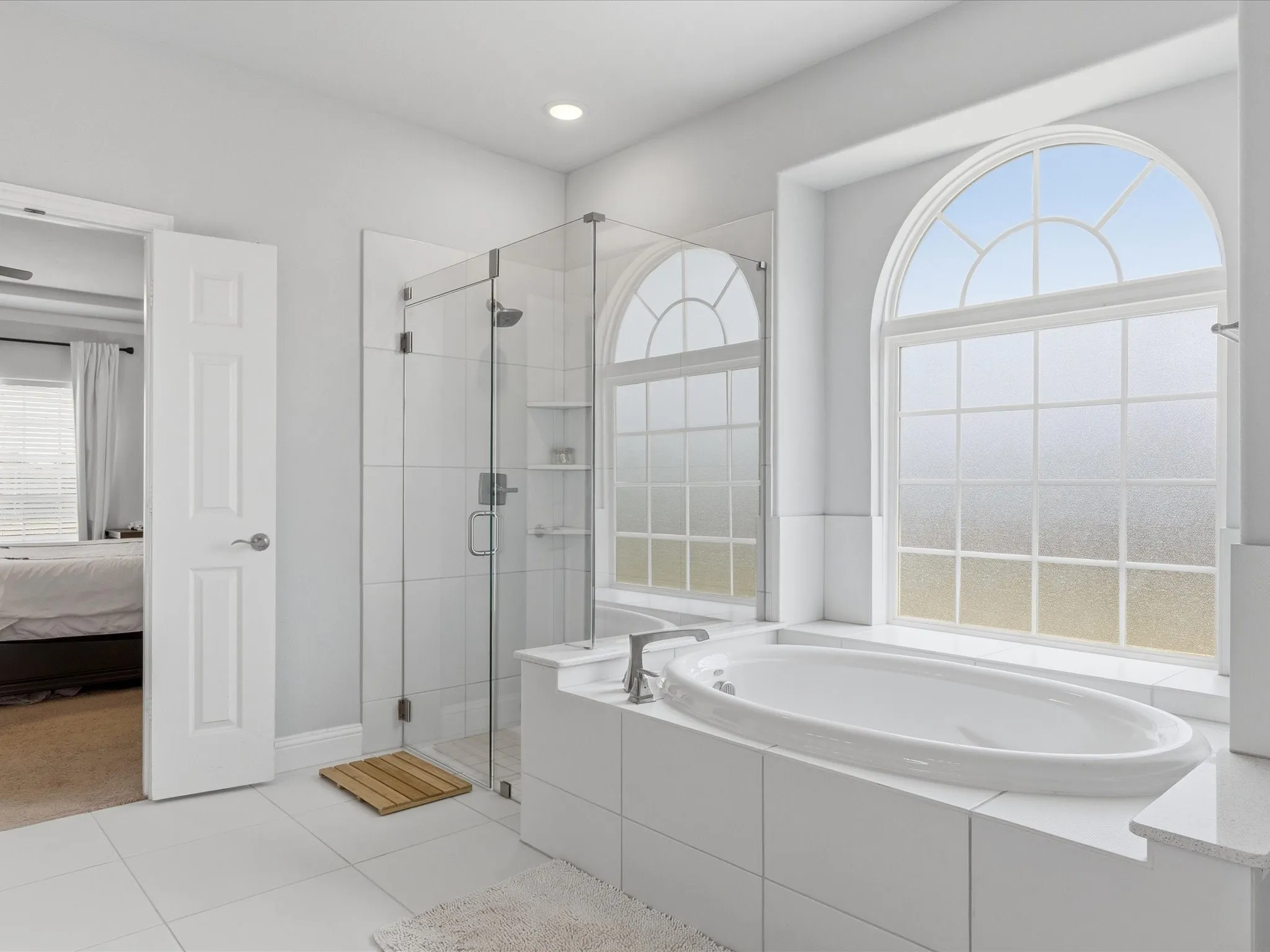 Primary bath has garden tub and separate shower