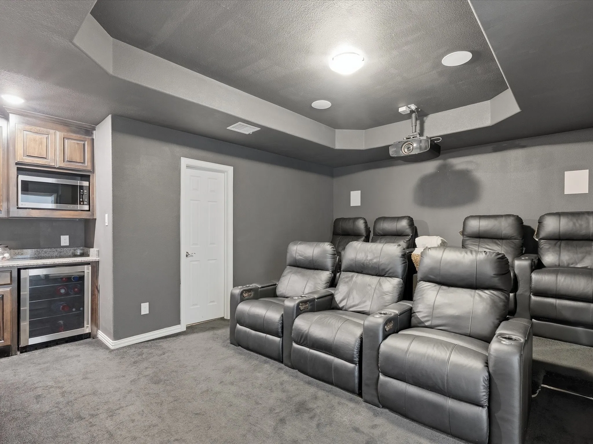 Media room with 6 theater chairs (chairs are negotiable)