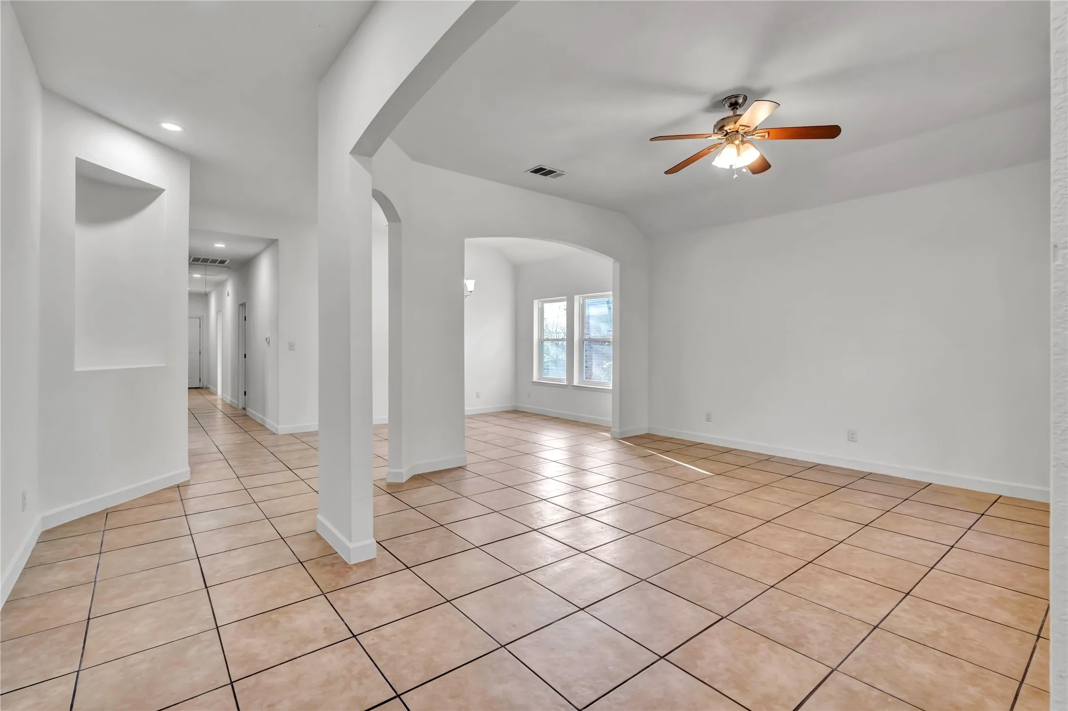 Spacious interior featuring tile flooring throughout