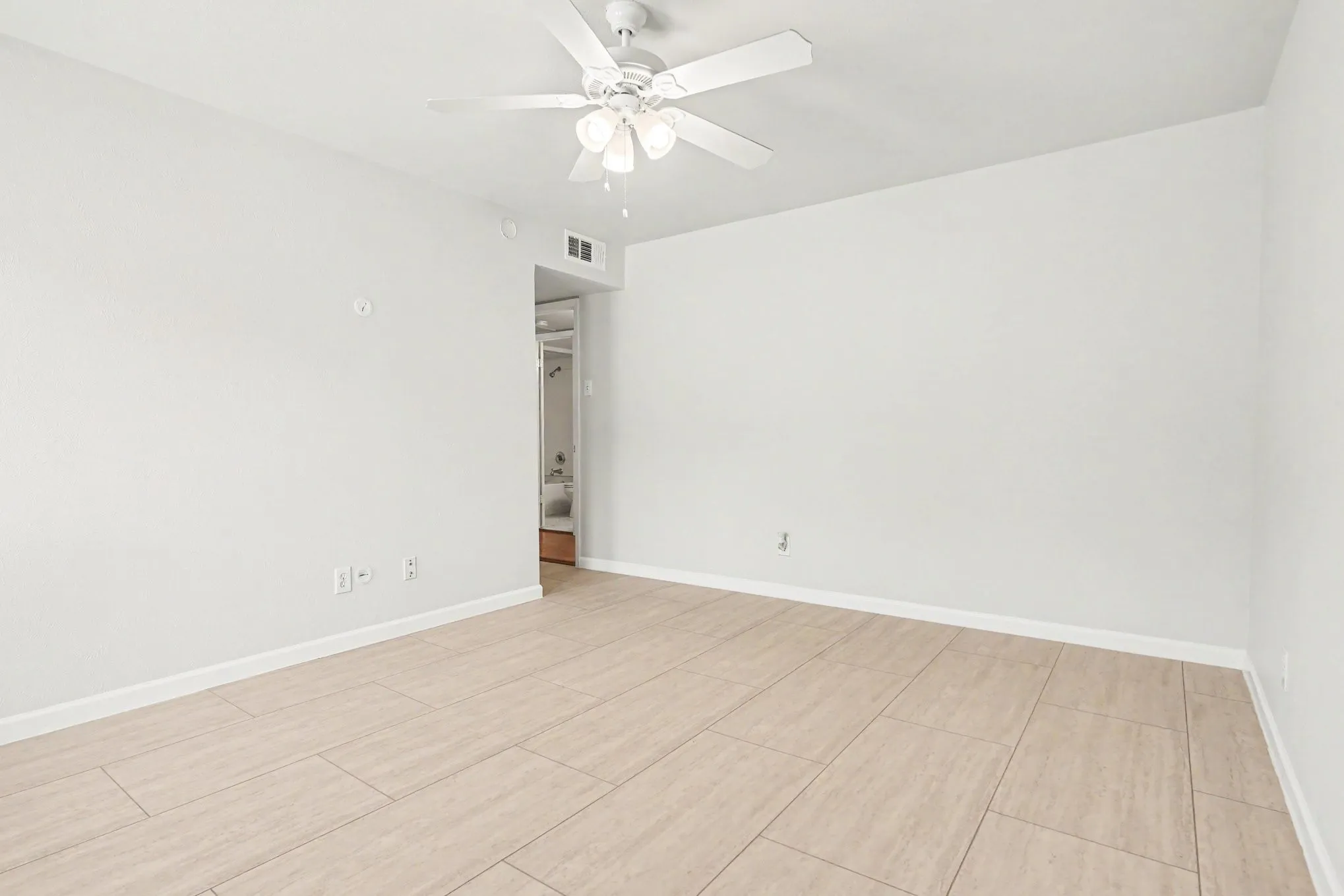 This bedroom view is from the windows toward the entrance.  The walk-in closet is directly across from the entrance door.