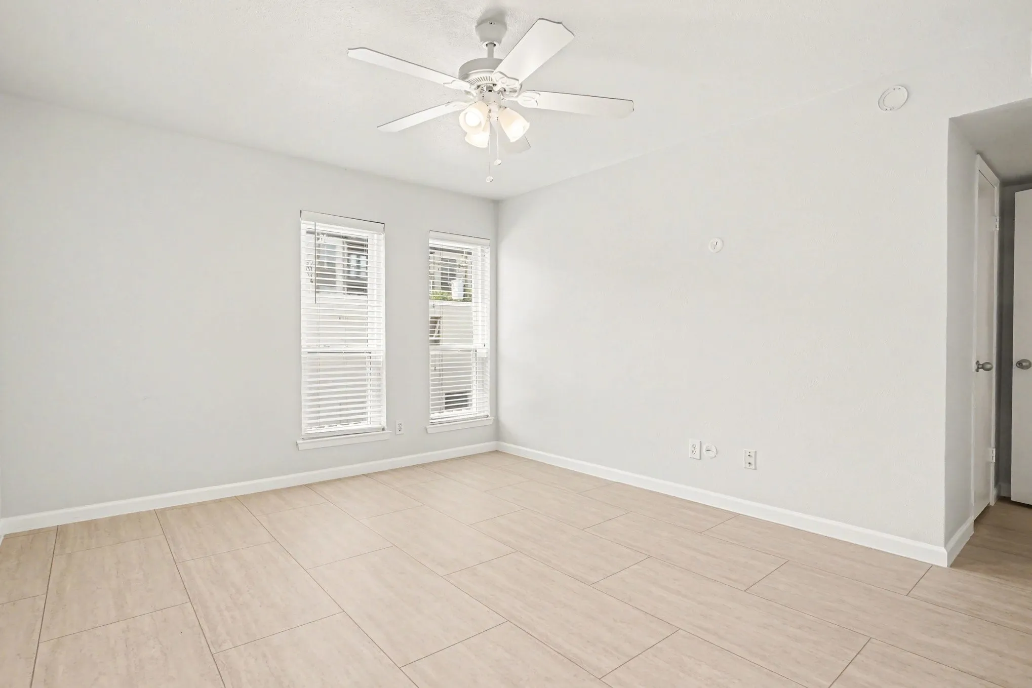 This bedroom view shows the walk-in closet door to the right.