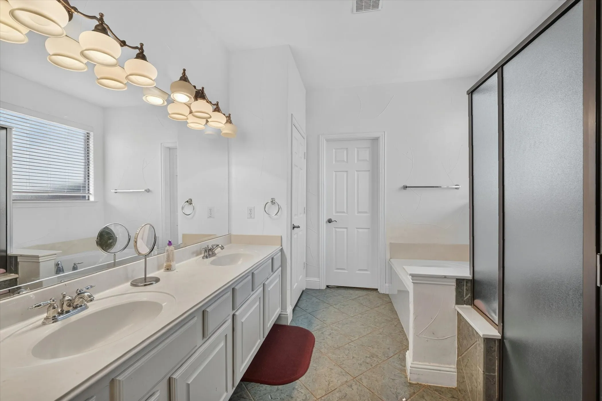 Dual vanity with undermount sinks and chrome fixtures