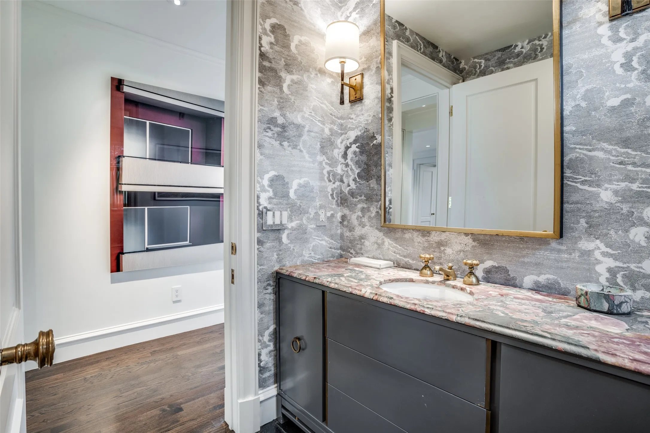 Powder room off the entry- one of two on the first floor.