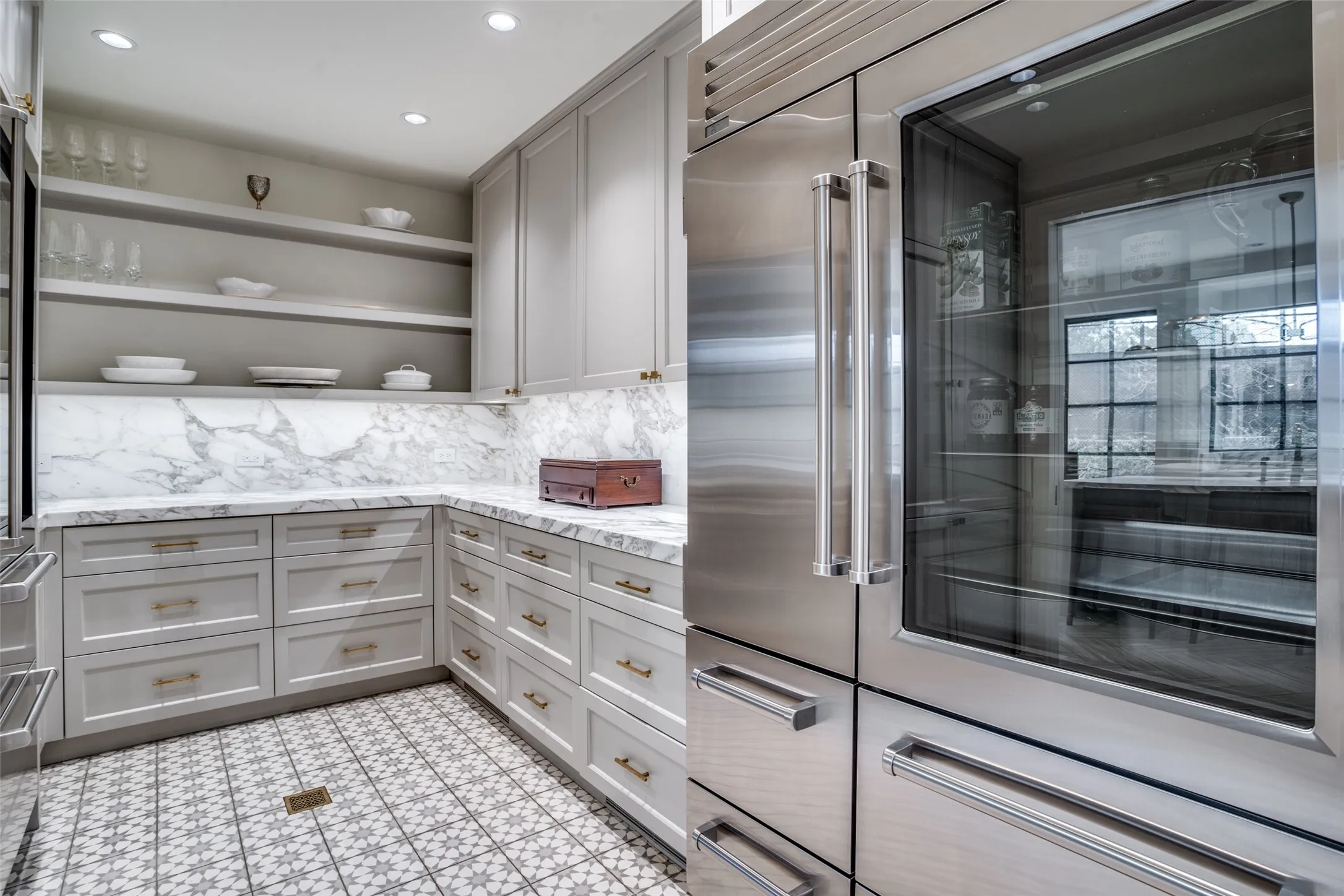 More than a Butler's Pantry.  Sub-Zero refrigerator / freezer,  a wine fridge and loads of storage and workspace.