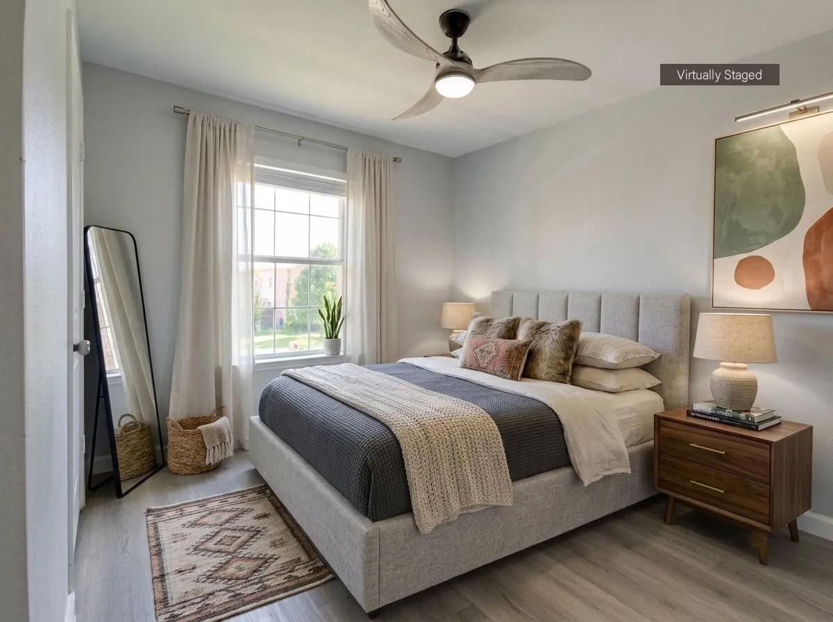 Light wood-finish flooring complements the neutral wall color