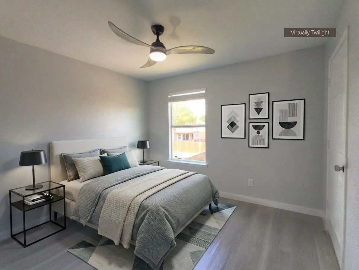 Bedroom featuring light wood-finish flooring, a ceiling fan with integrated lighting, and a window with a white frame