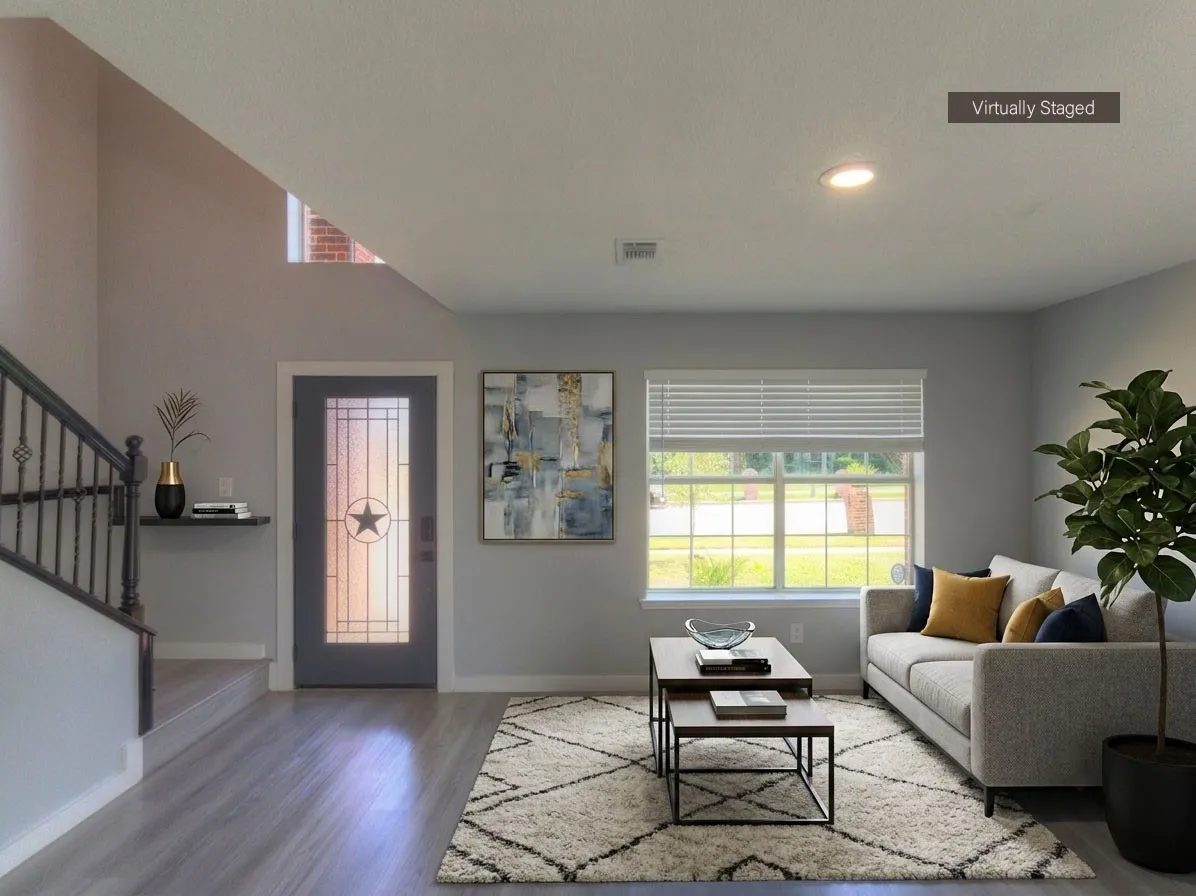 Entryway featuring a decorative frosted glass door with star accent and grey wood-finish flooring