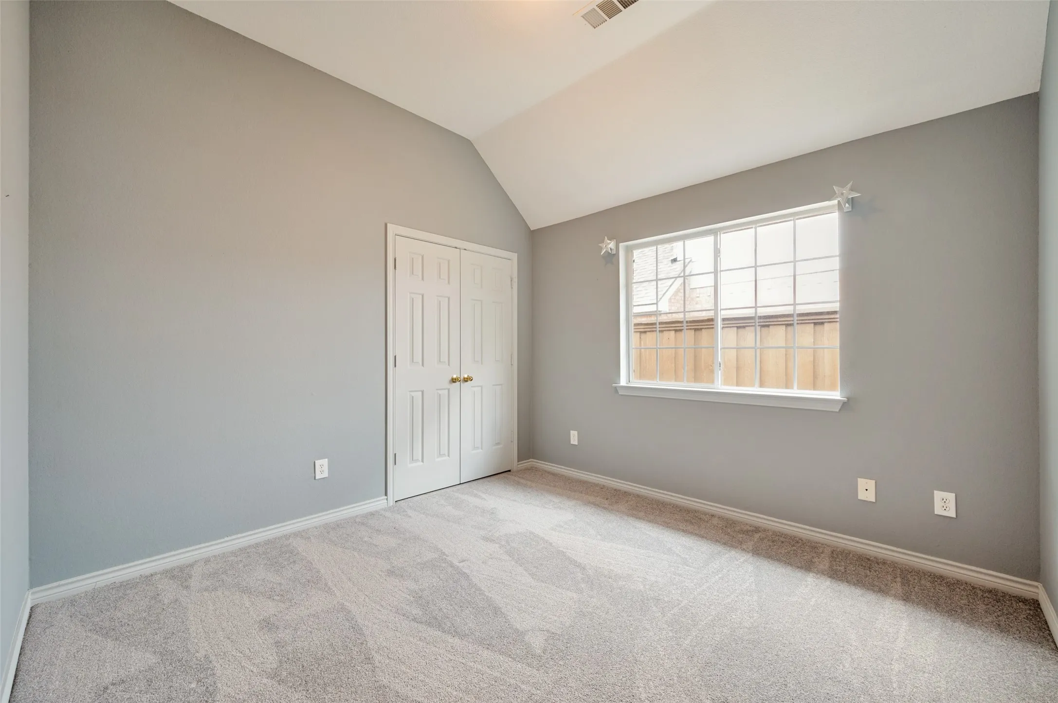 Two of three secondary bedrooms.