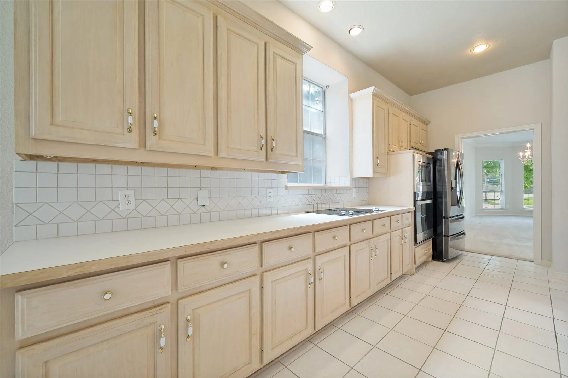 Lots of cabinets.  Light, bright, and open to the family room.