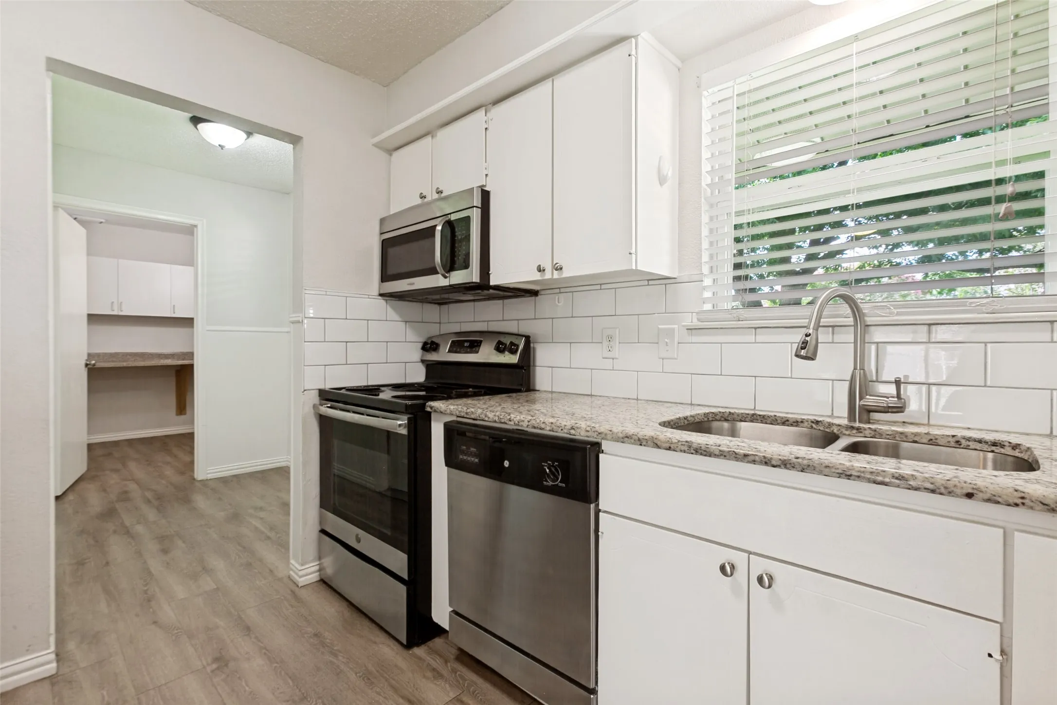You can keep an eye on the neighborhood right from the kitchen sink!