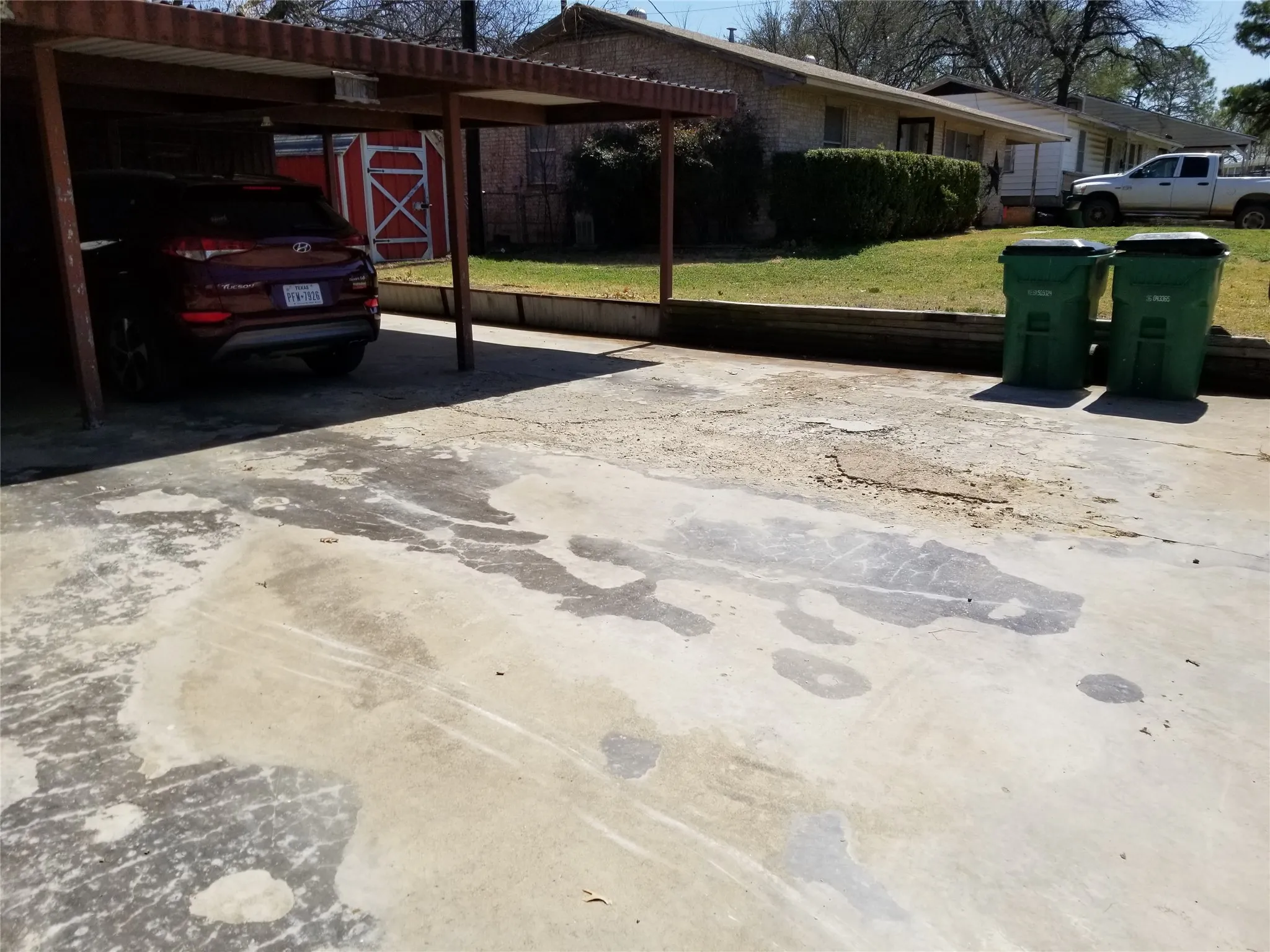 Carport w/ workshop on far end.