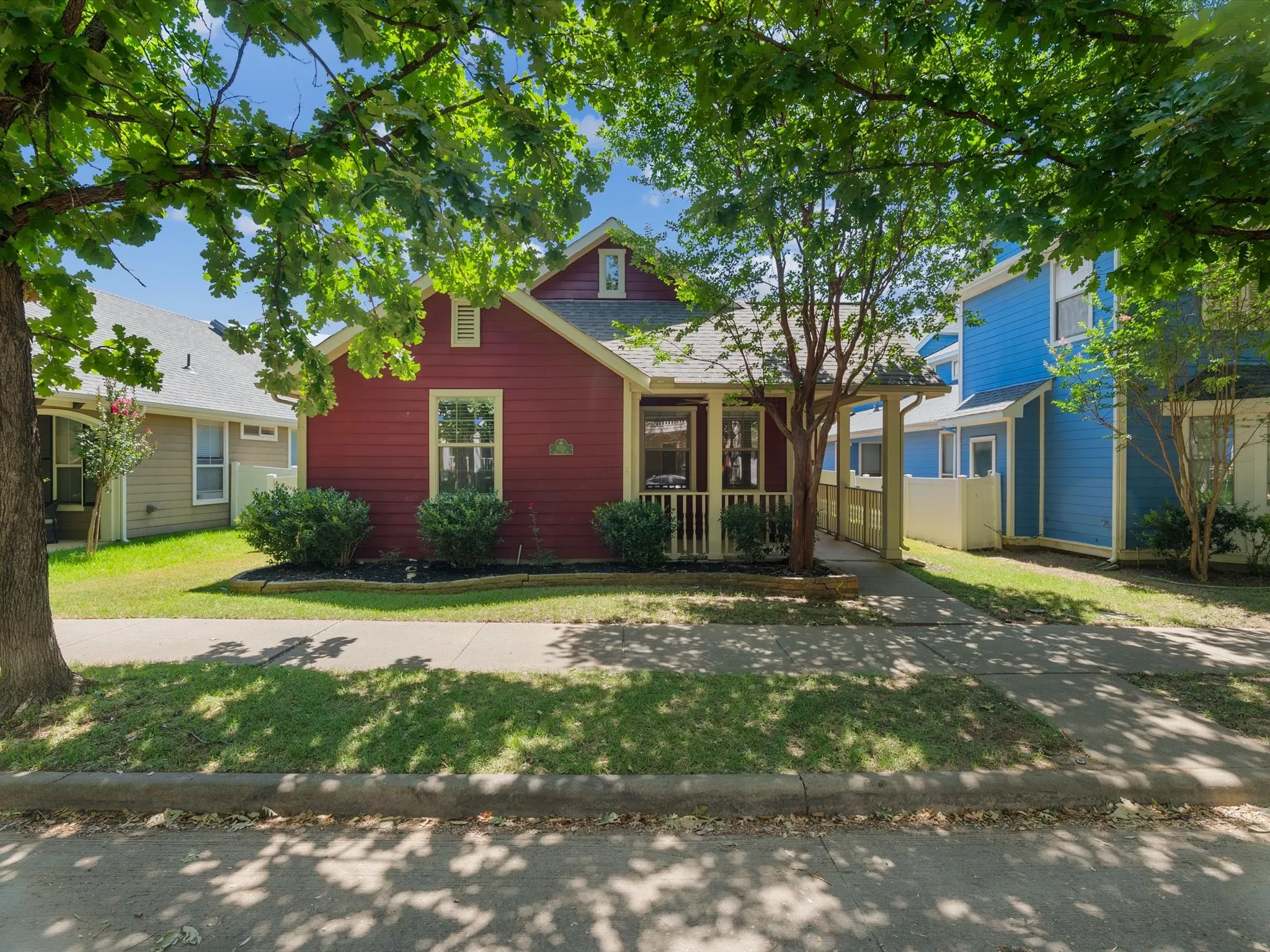 Front view of home, the front porch is perfect for your porch swing