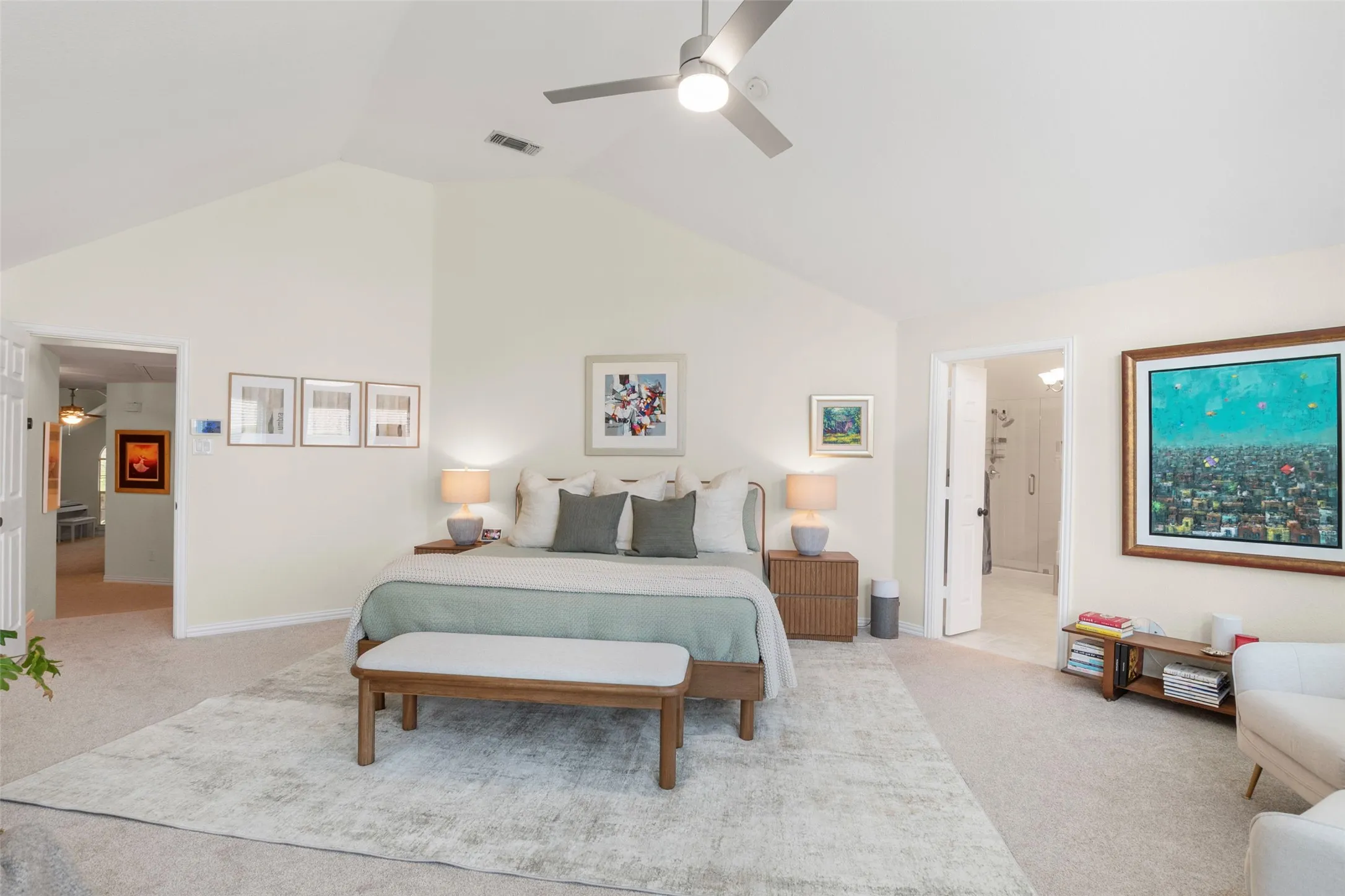 Vaulted ceiling with an installed ceiling fan and light fixture