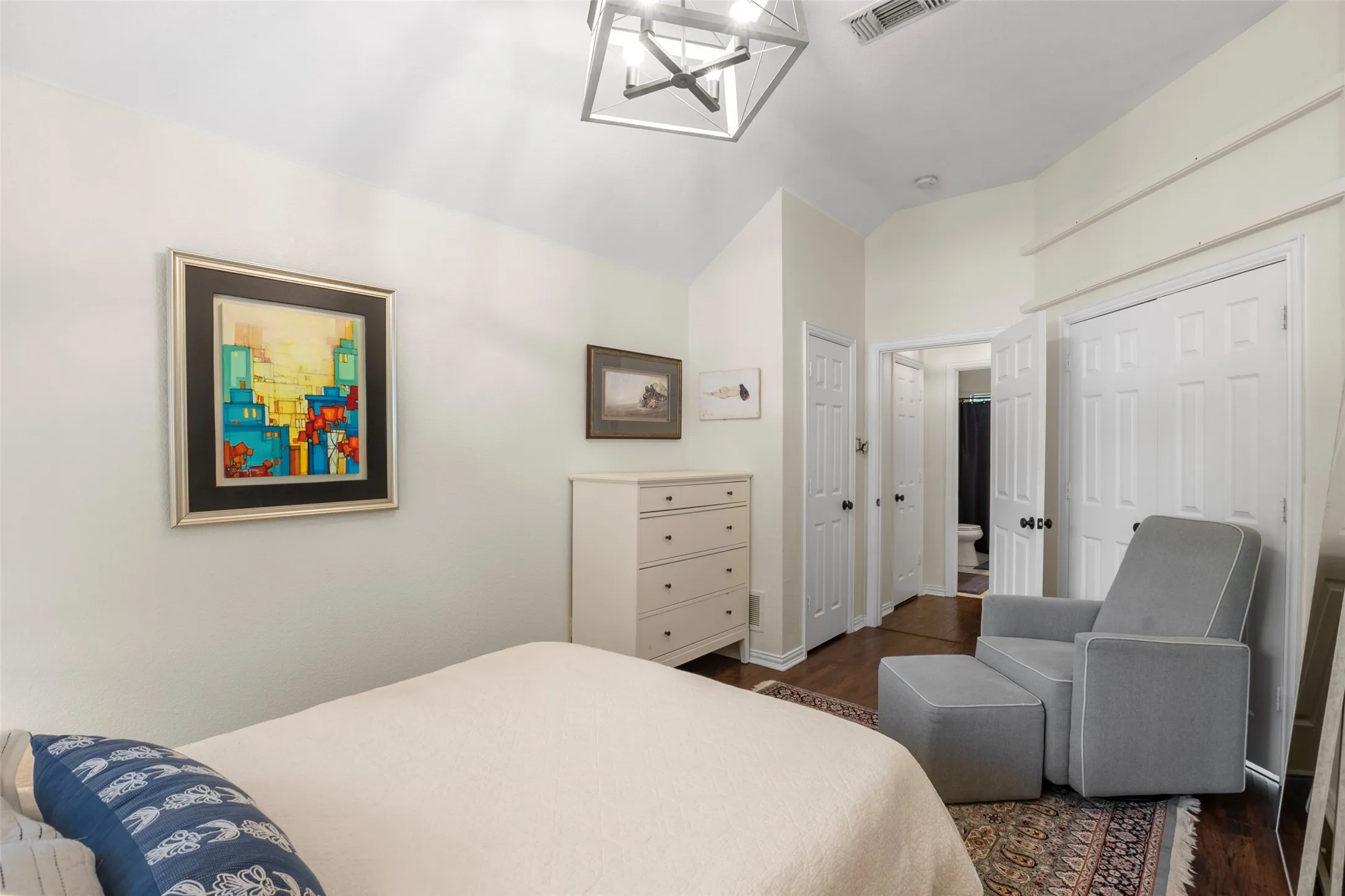 Neutral wall tones with wood-finish flooring