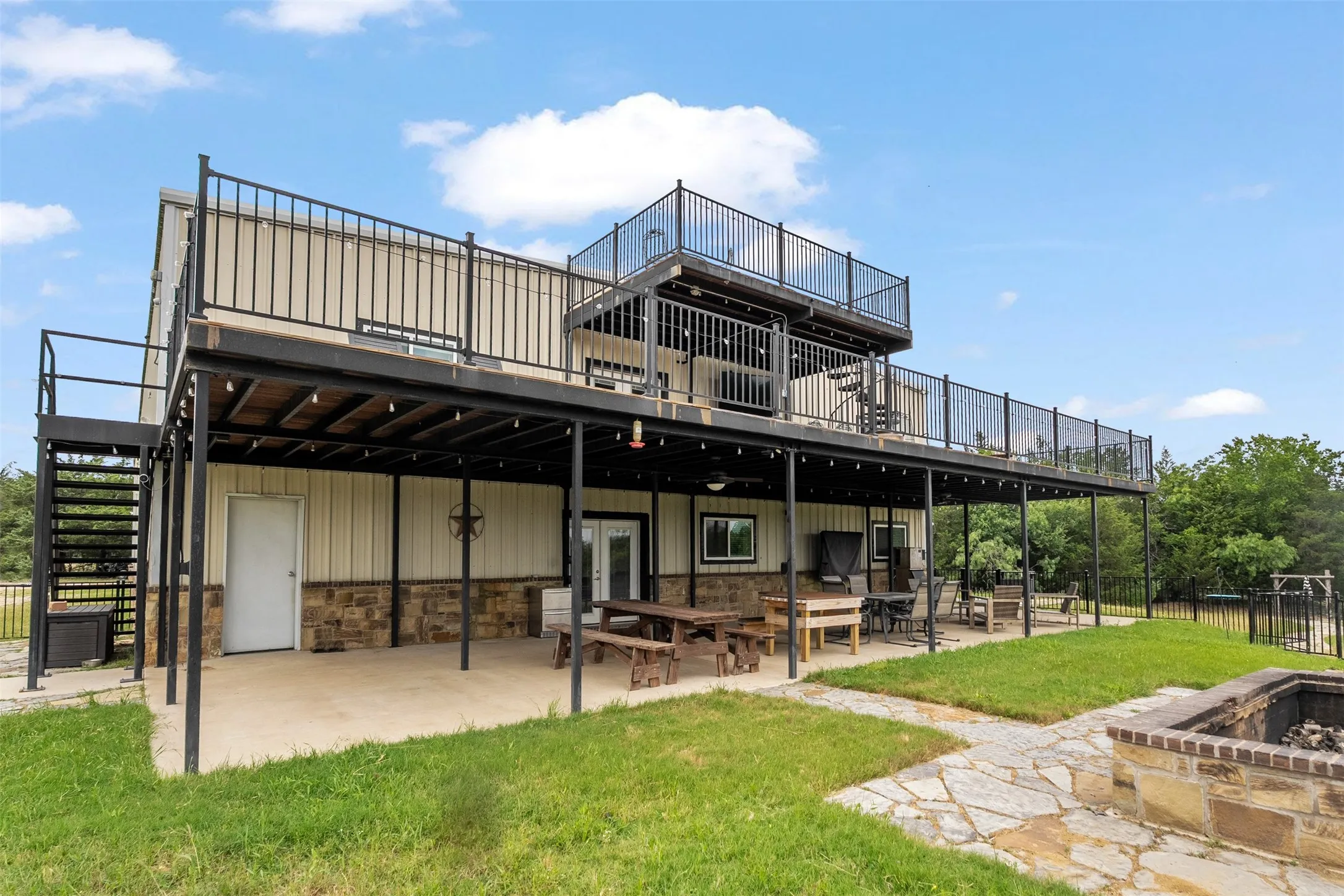 Three levels of outdoor living space ideally designed for both relaxation and entertainment!