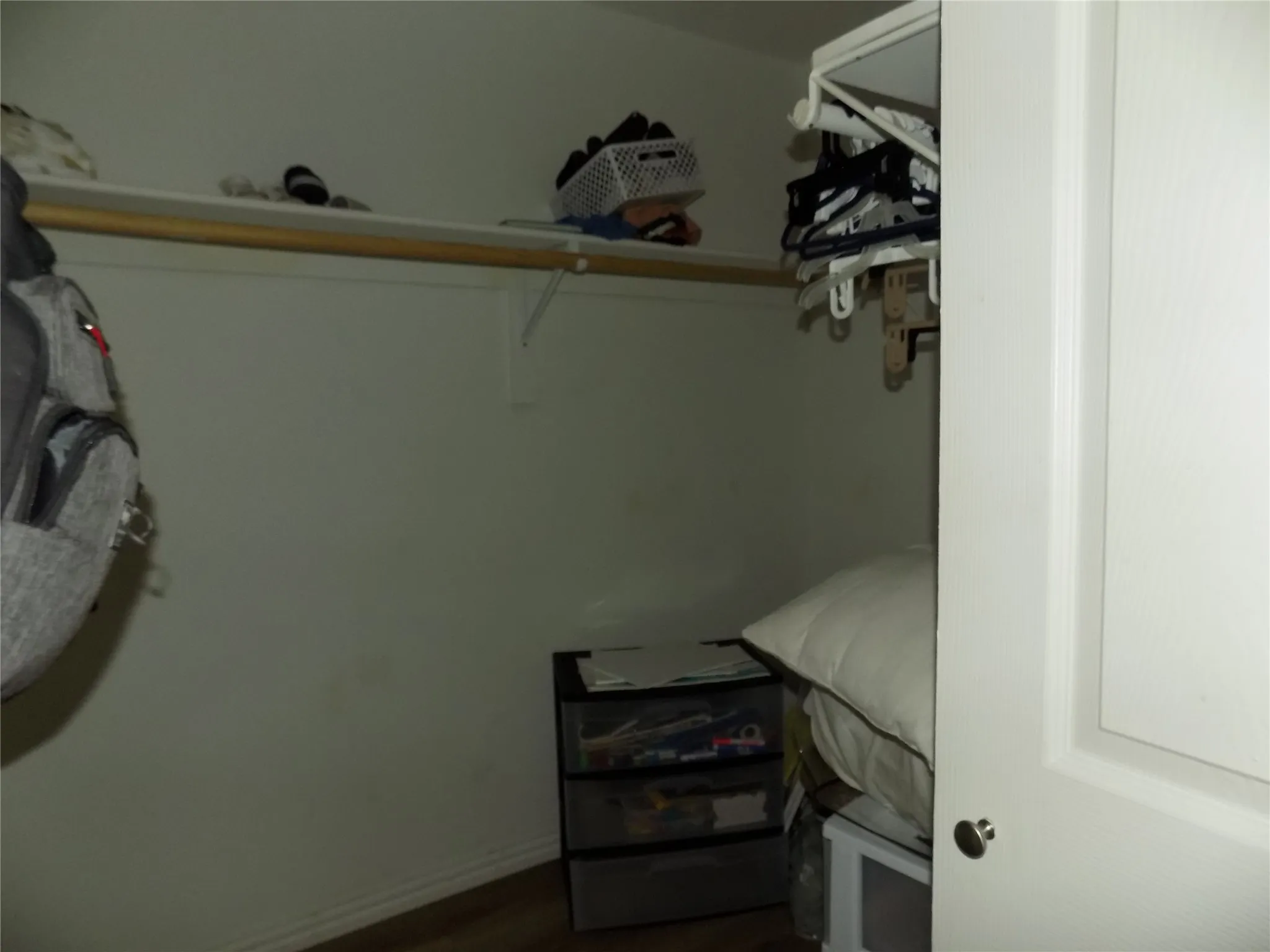 Large walk-in closed in hallway.