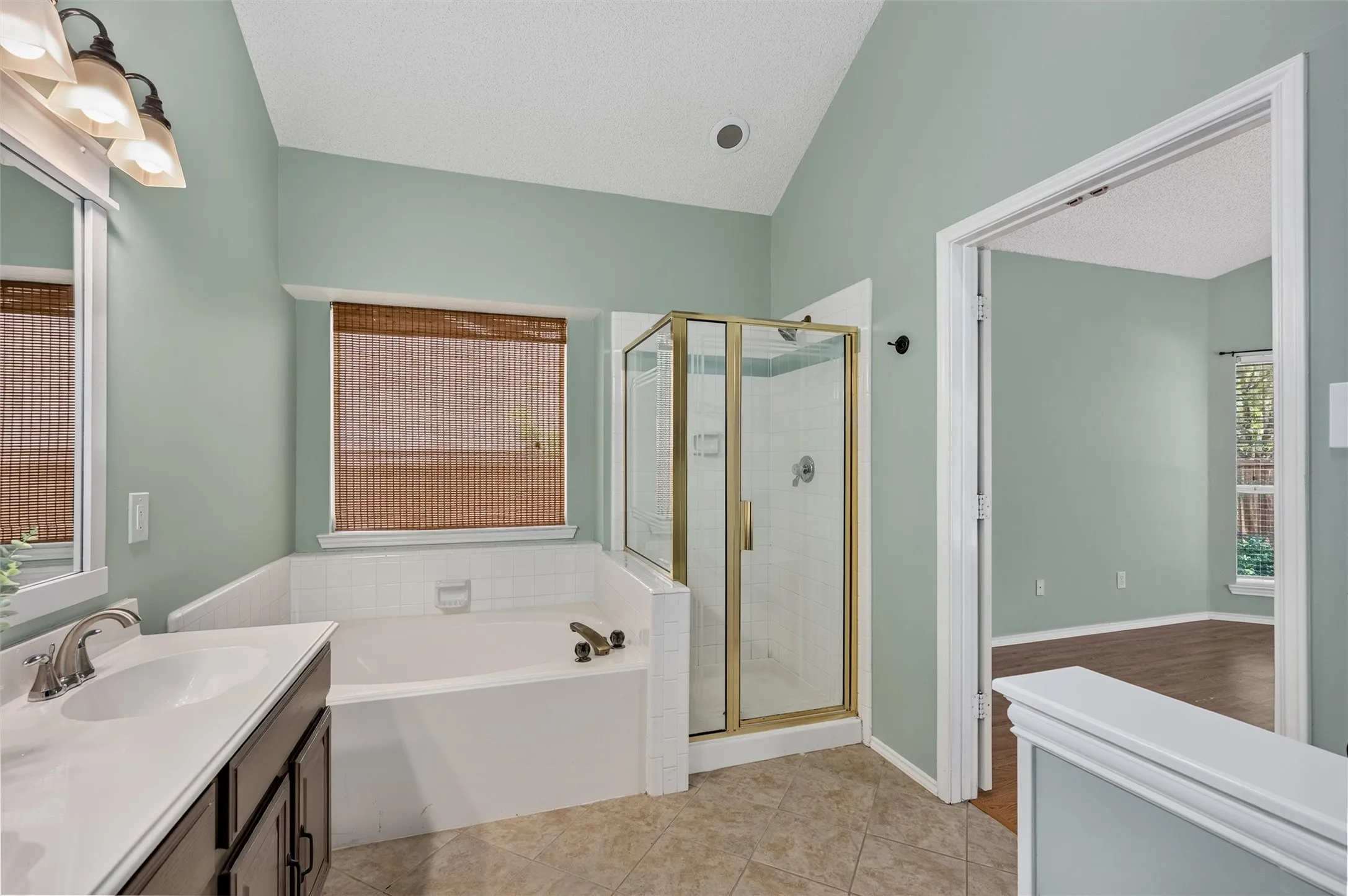 Jetted large soaking tub and walk in shower