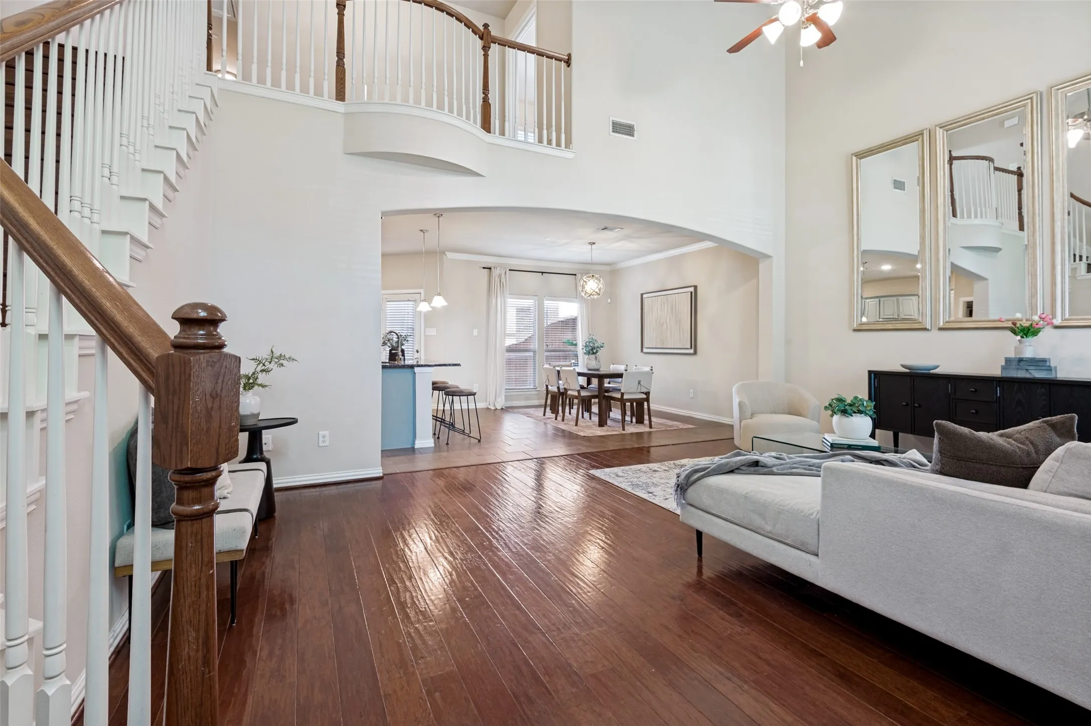 Open-concept living space showcasing the connection between the living room, kitchen, and dining area—ideal for everyday living and entertaining.
