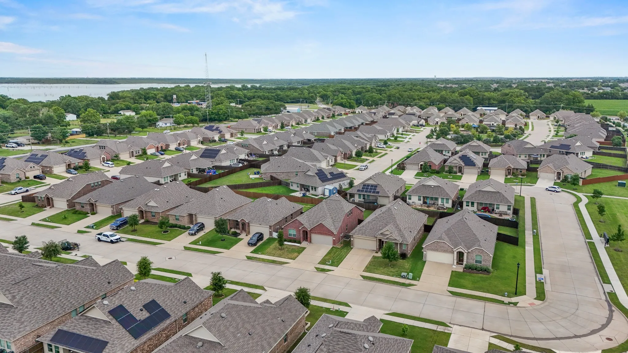 Aerial view showcasing a residential development with a consistent architectural style