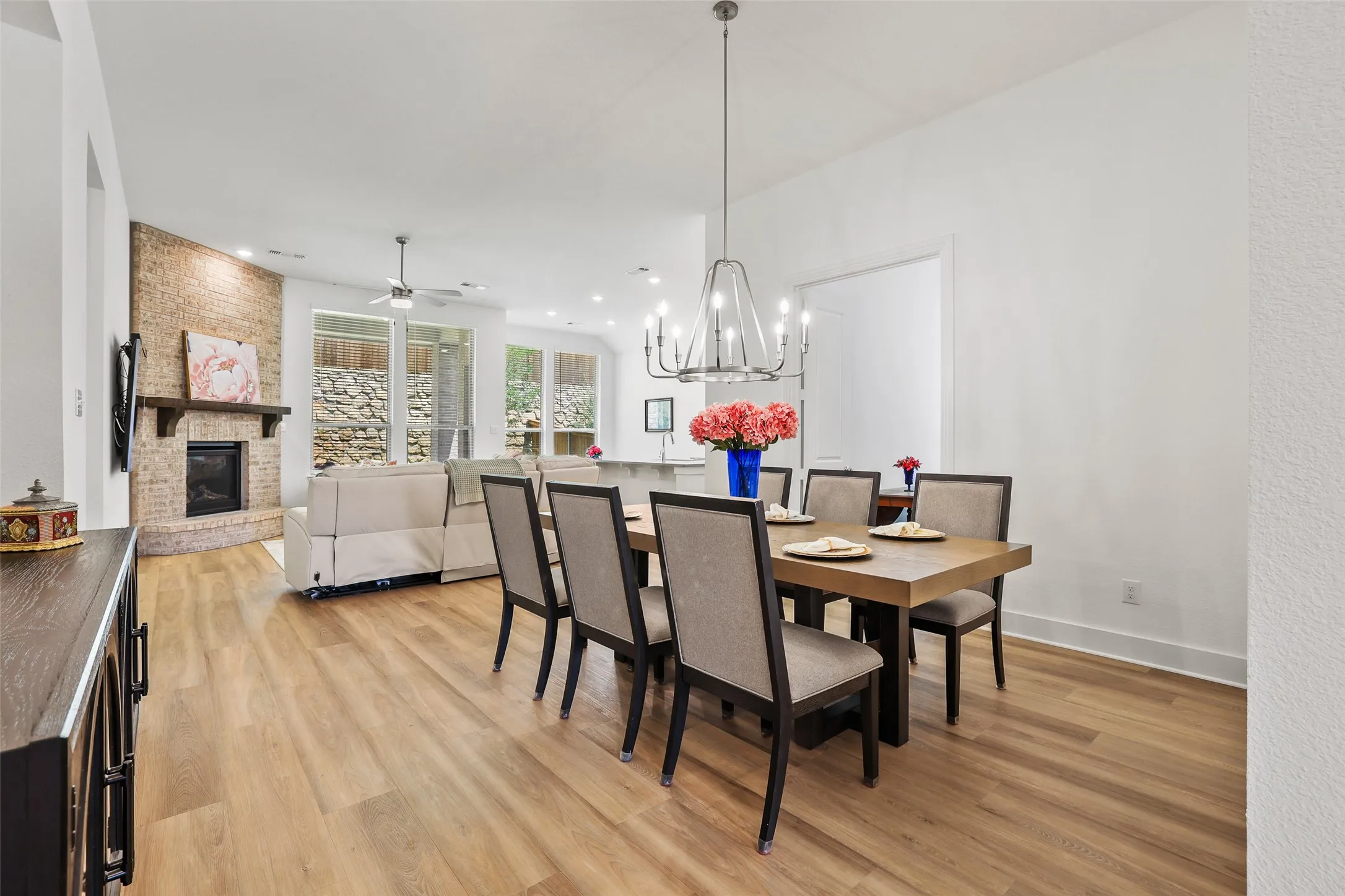 White oak luxury vinyl plank flooring throughout the common areas of the home