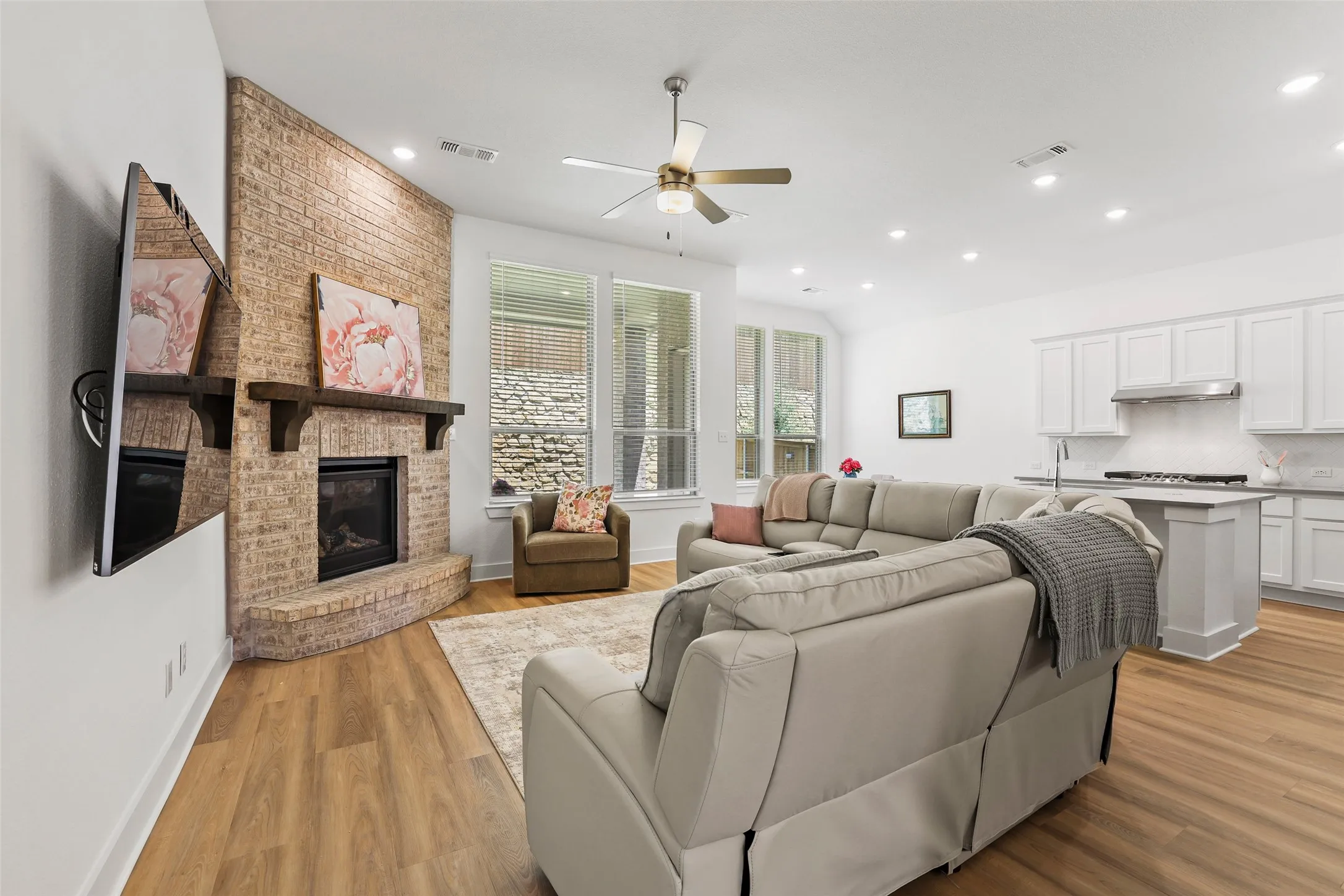 Open concept living with gas fireplace