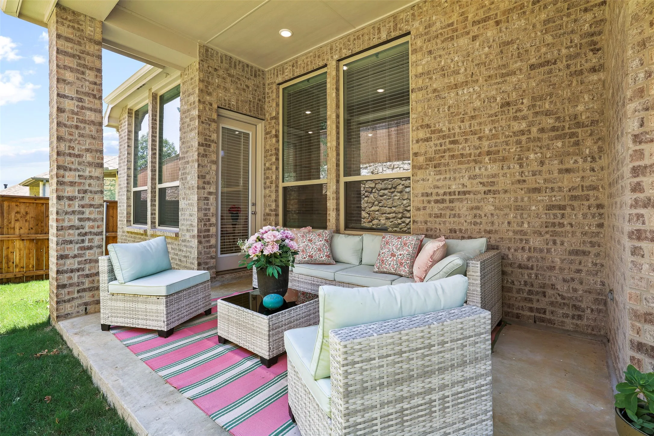 Expanded covered patio is the perfect spot for morning coffee or evening glass of wine