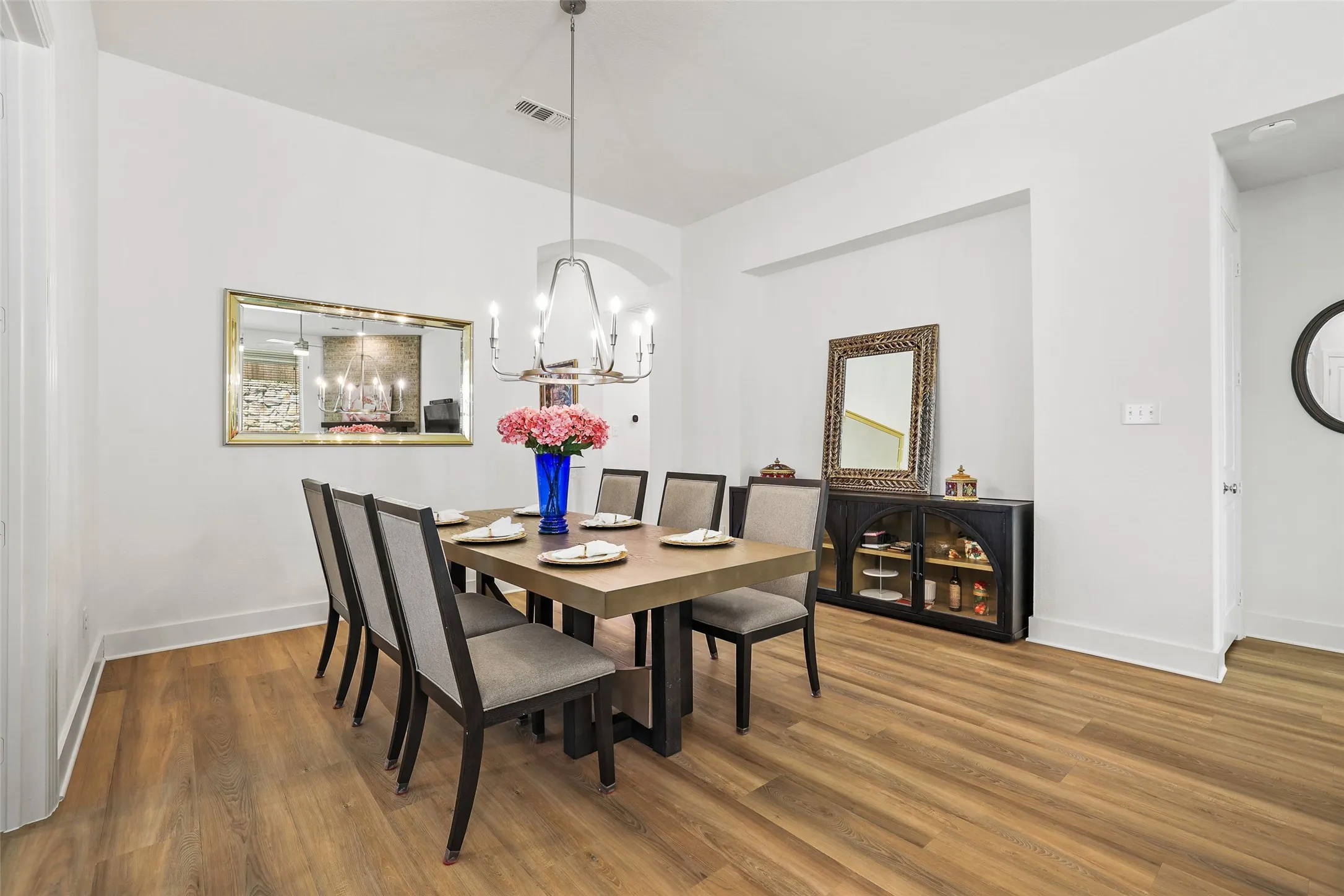 Dining area has a recessed niche perfect for storage or display