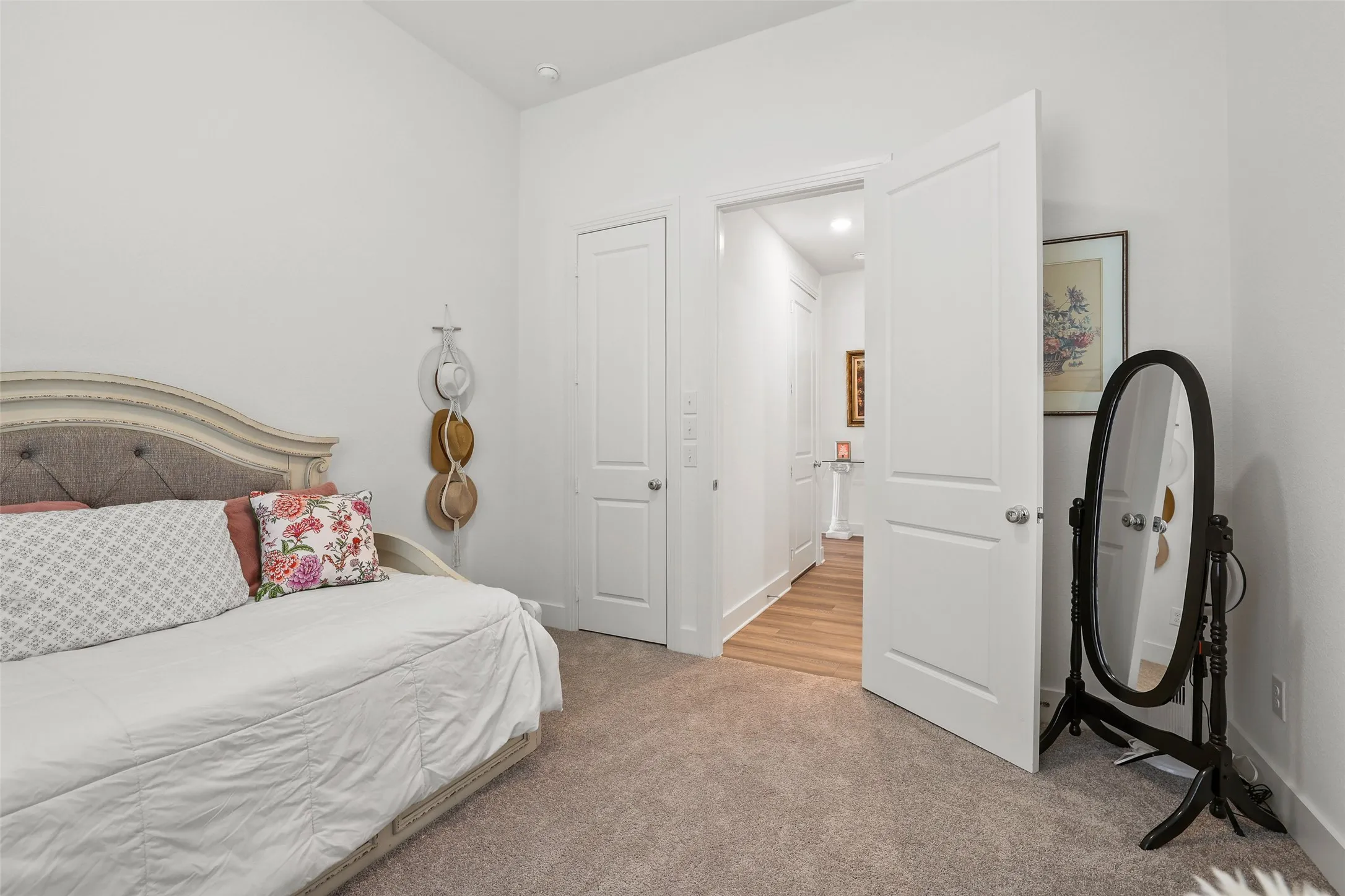 Secondary bedroom with walk in closet