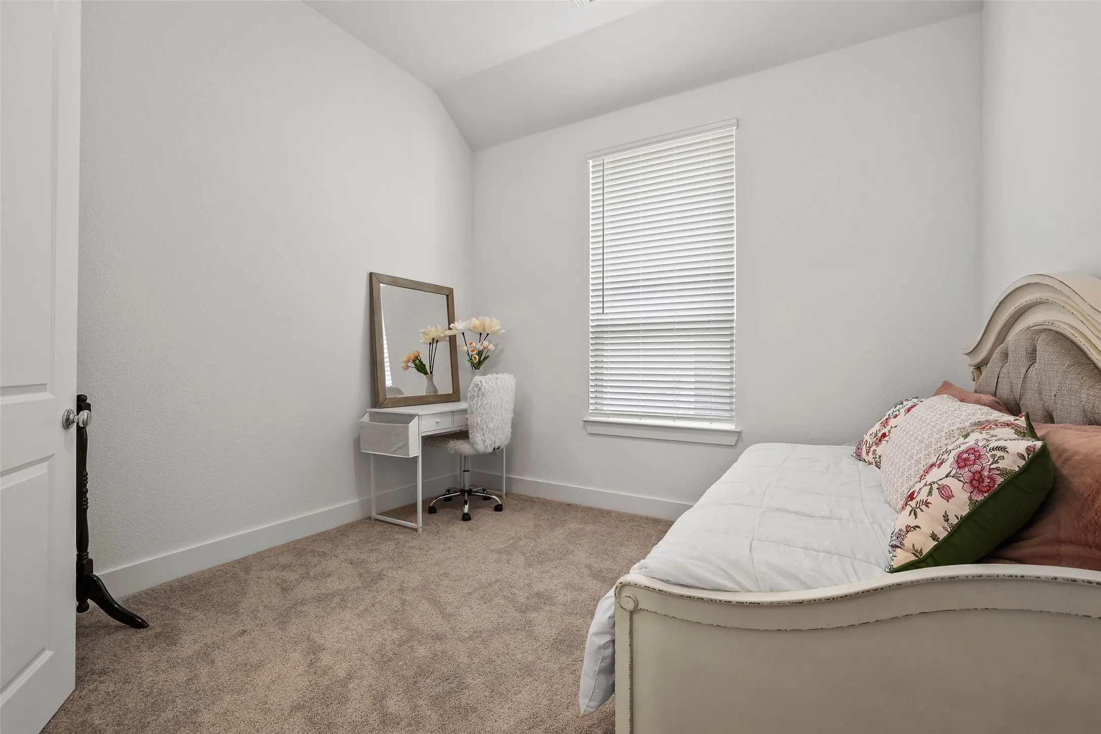 Secondary bedroom is separate from the other bedrooms for privacy