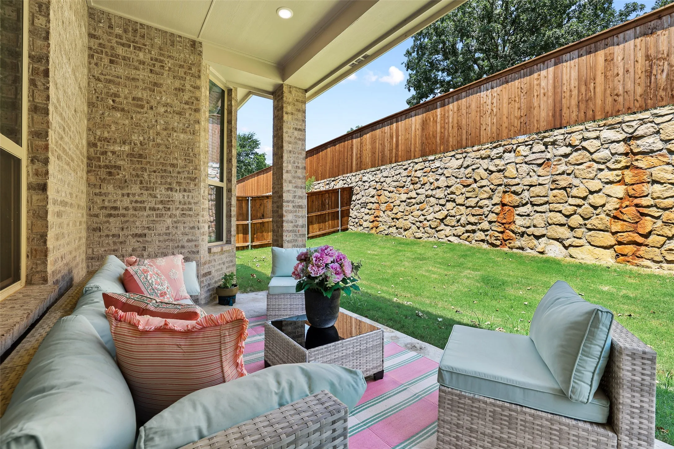 Expanded covered outdoor patio is the perfect spot to relax